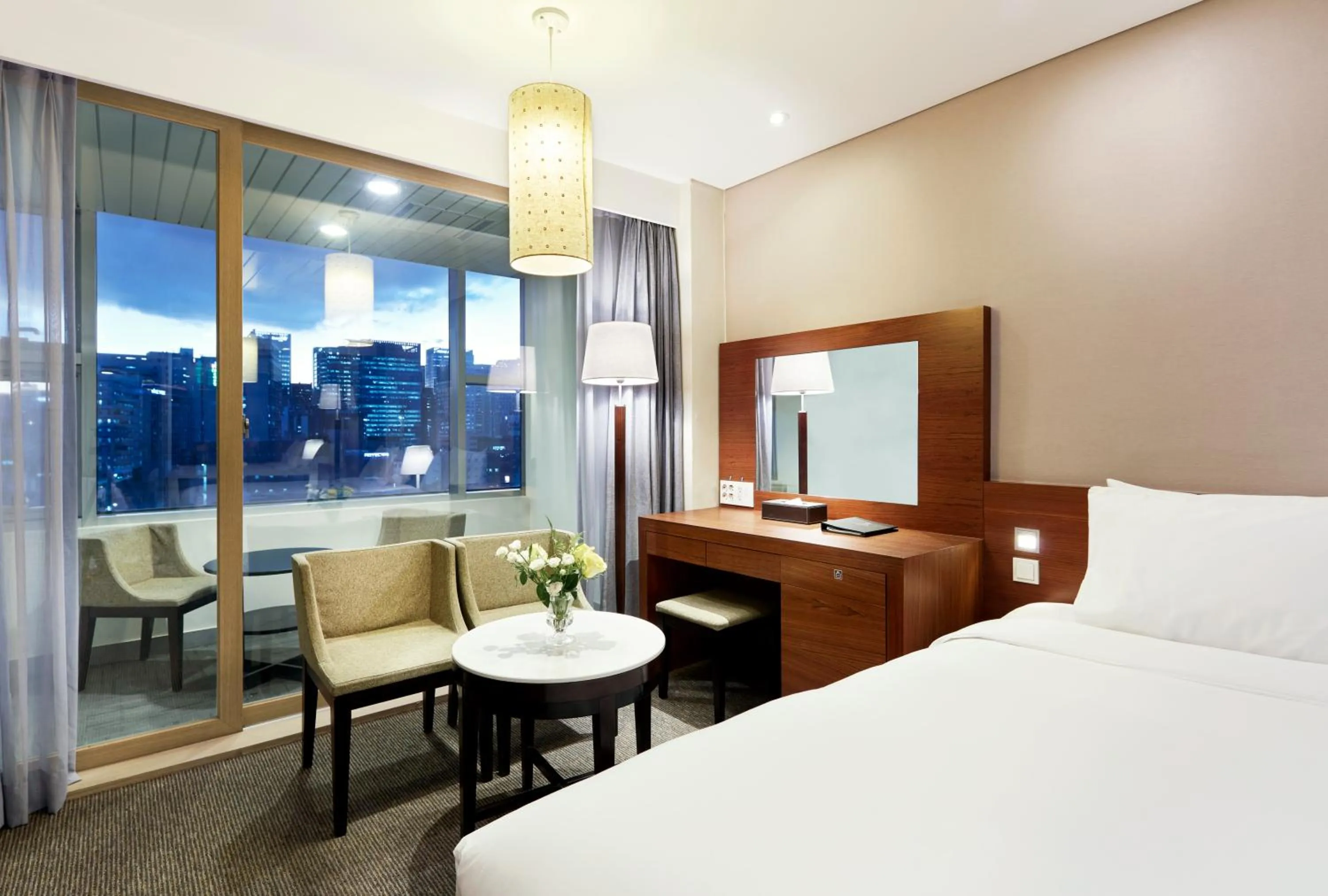 Living room, Bed in Hotel PJ Myeongdong