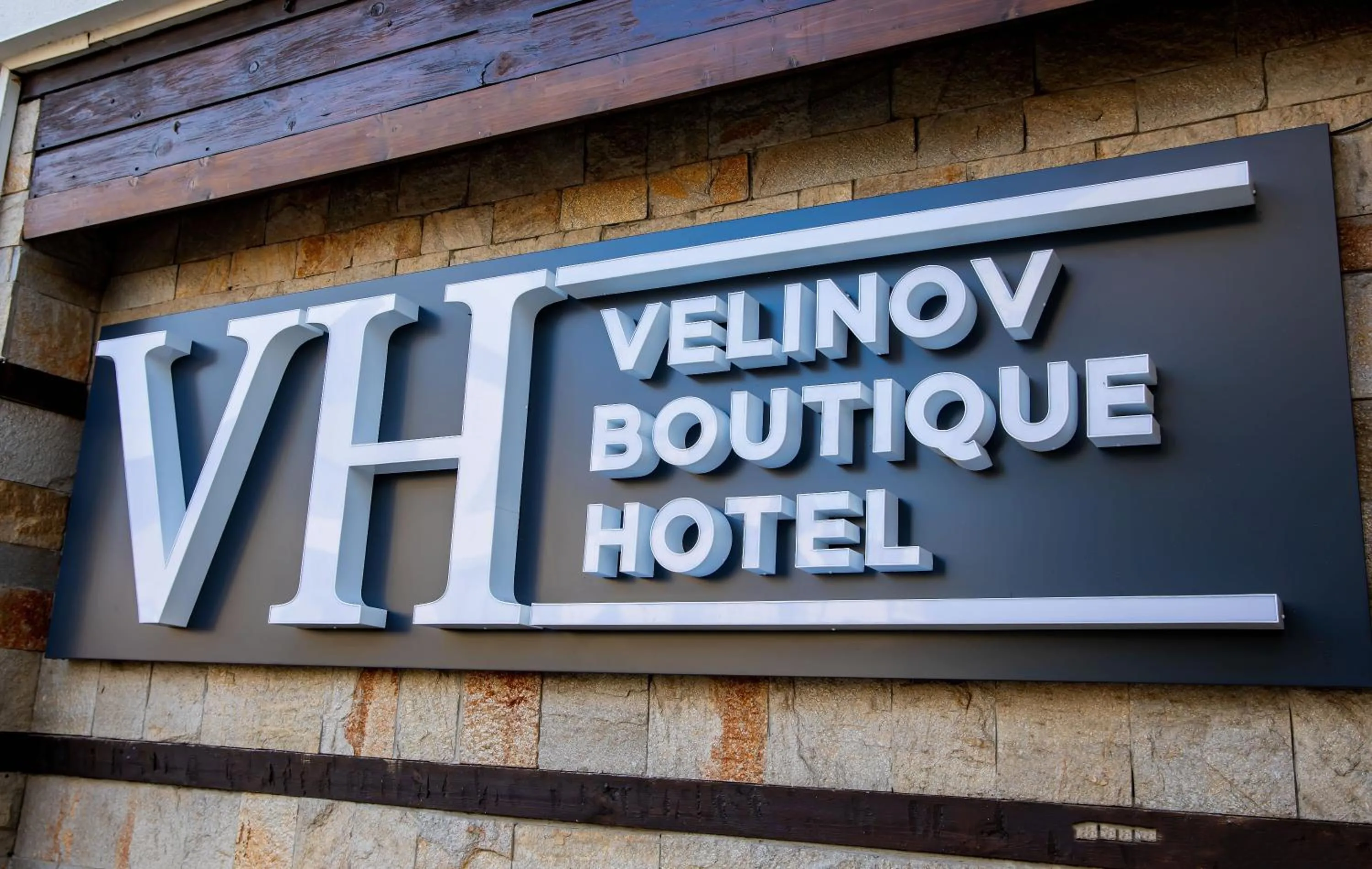 Property logo or sign in Velinov Boutique Hotel with Free Shuttle