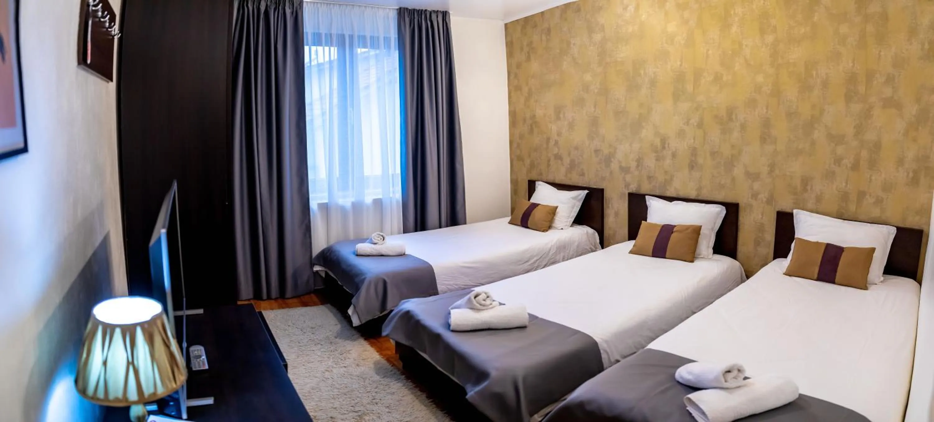 Bed in Velinov Boutique Hotel with Free Shuttle