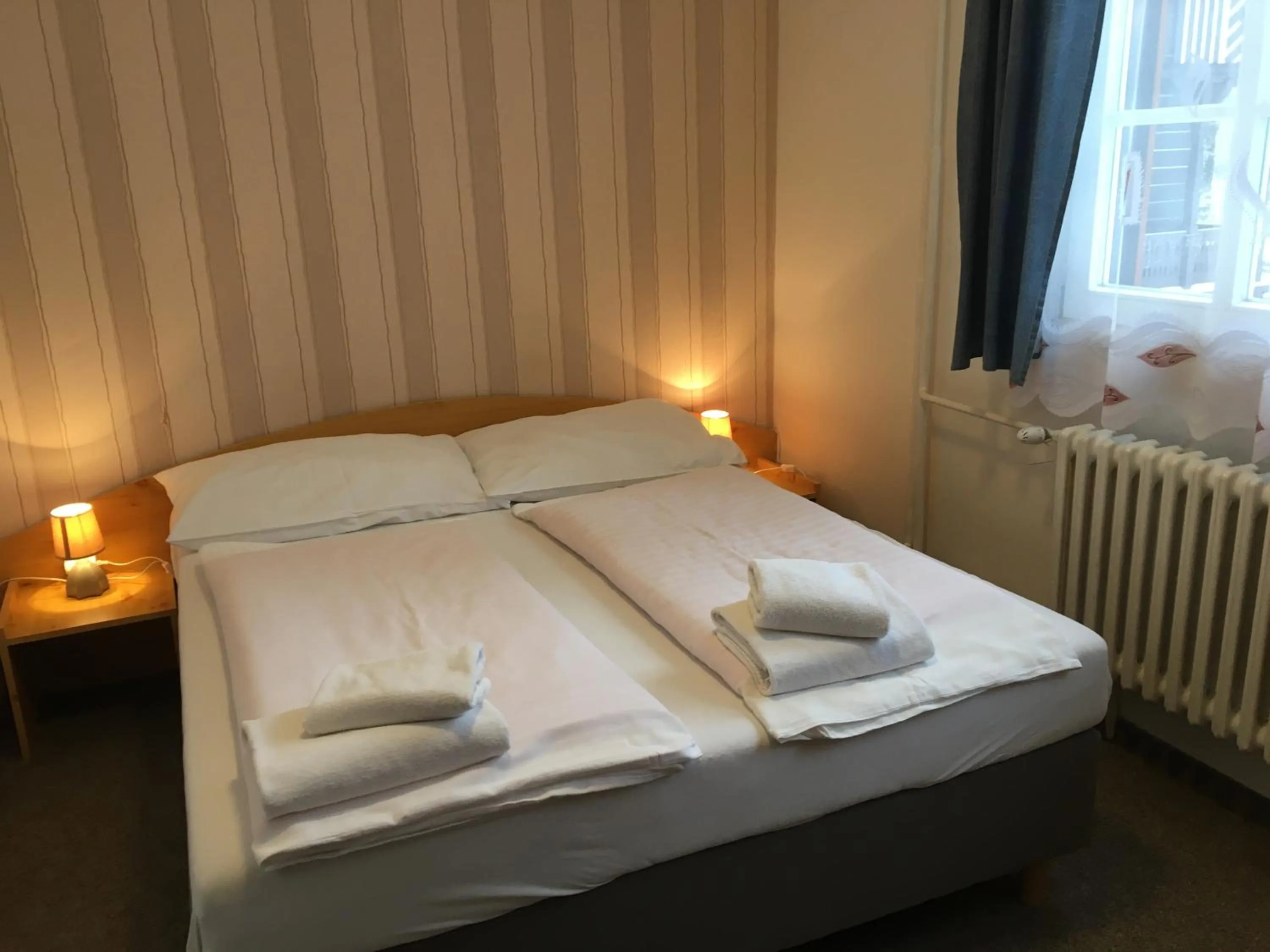 Bed in Hotel Tři Růže