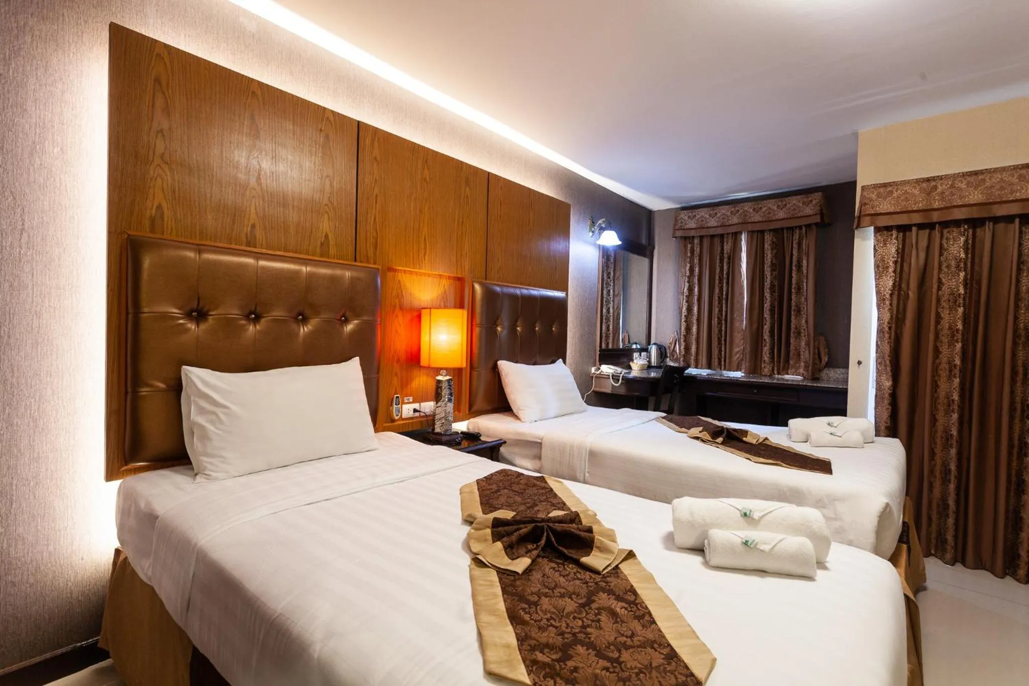 Bed in The Airport Greenery Hotel