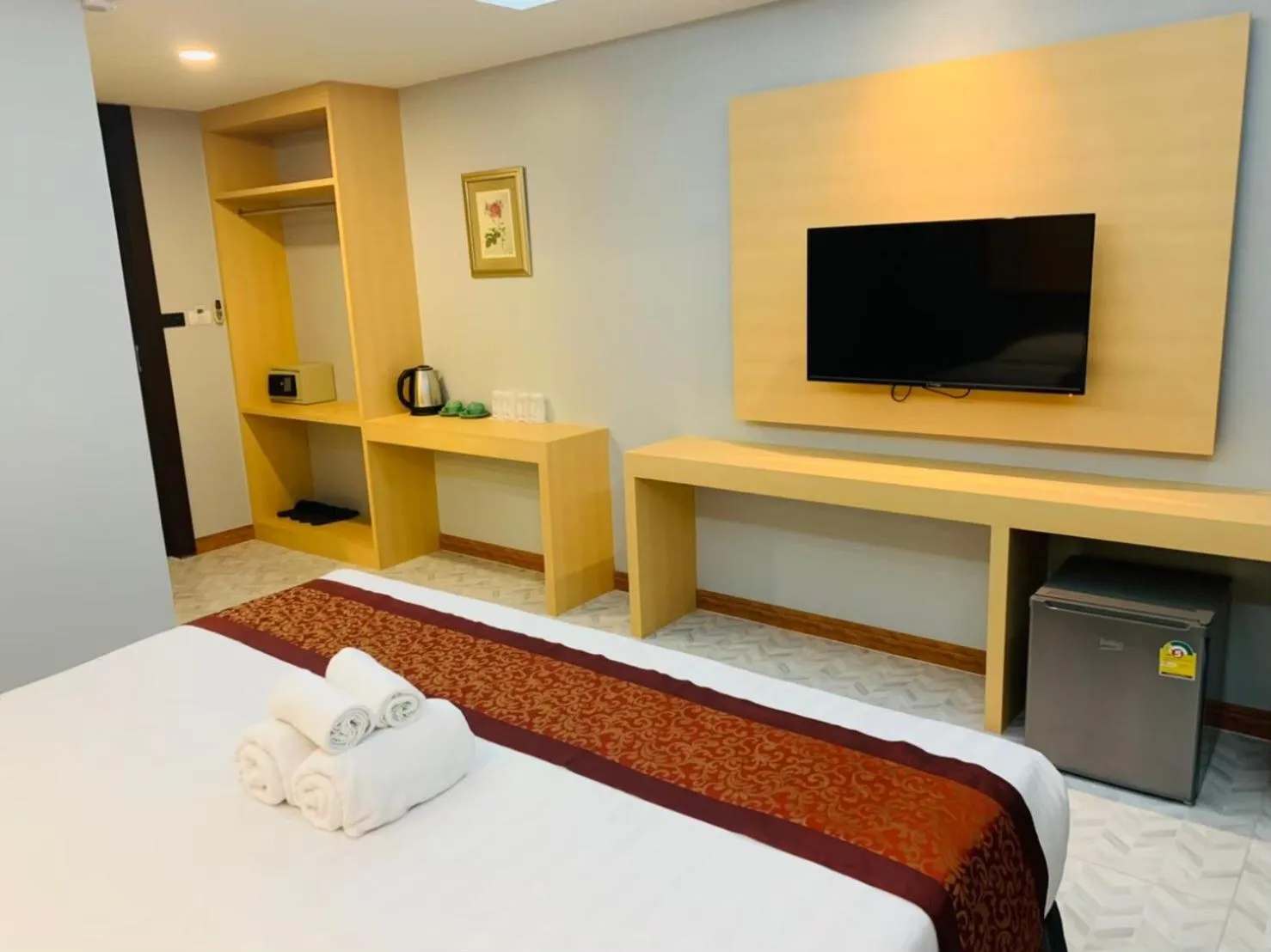 Bed in The Airport Greenery Hotel