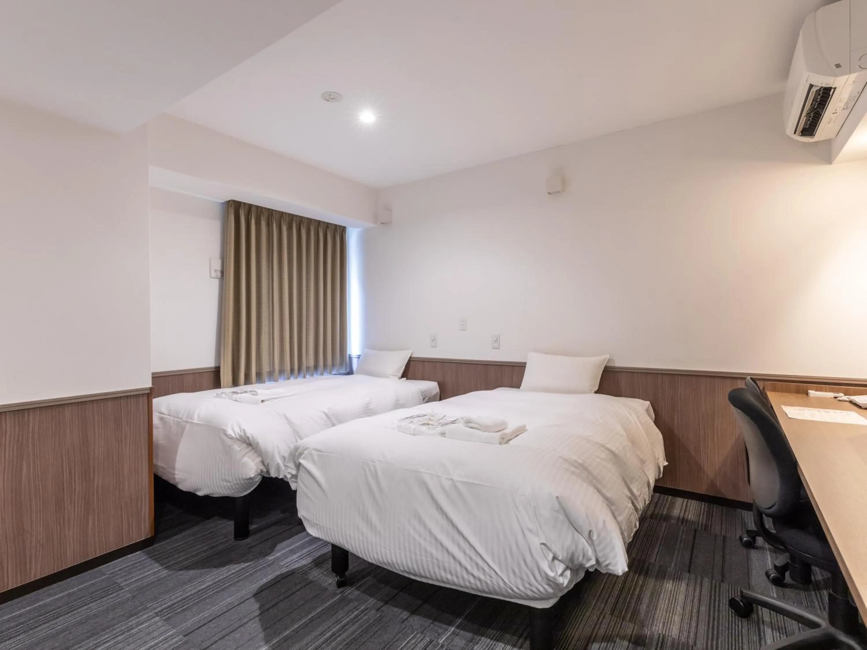 Bed in Hotel Excellence Enmachi Ekimae