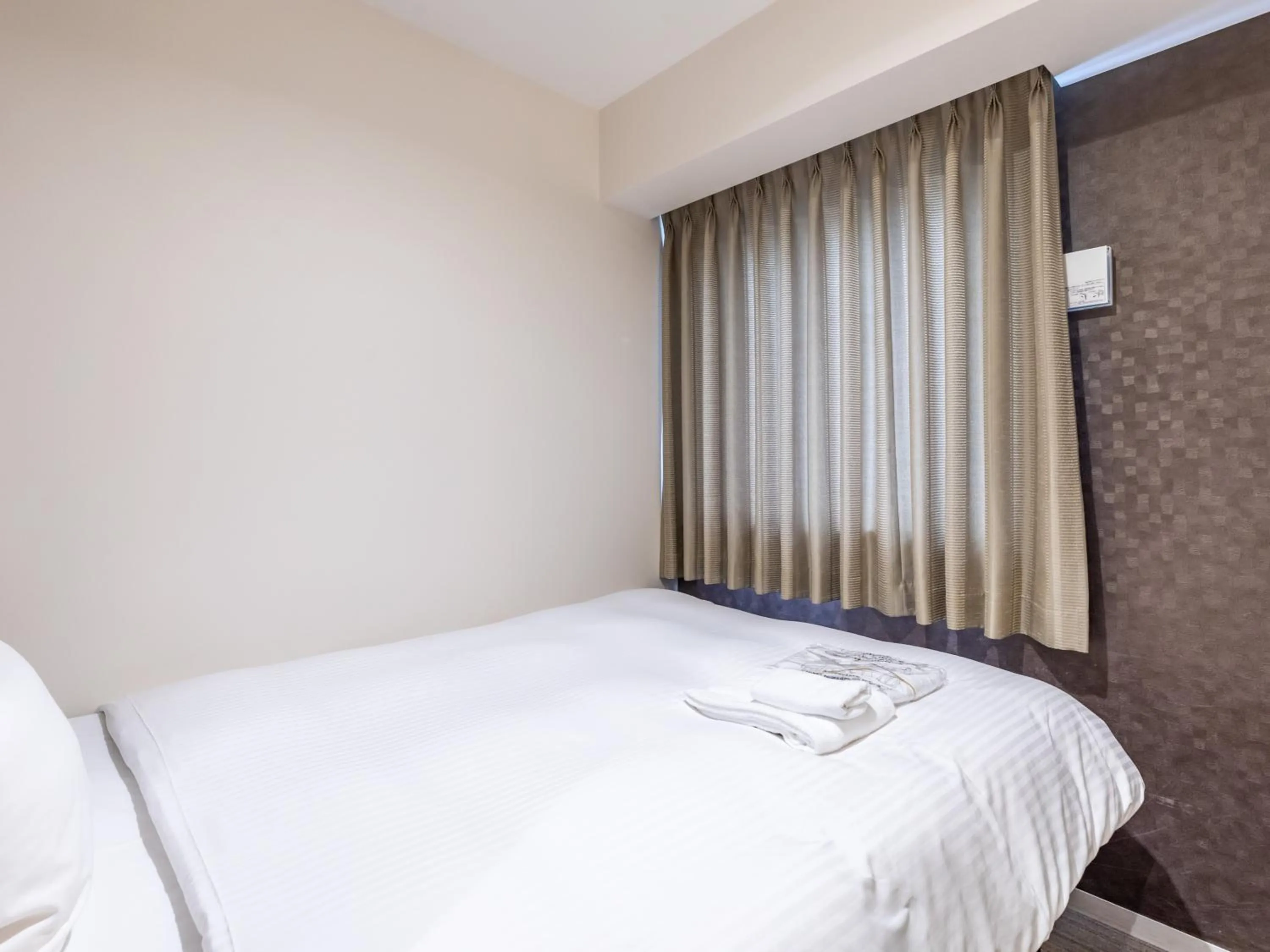 Bed in Hotel Excellence Enmachi Ekimae