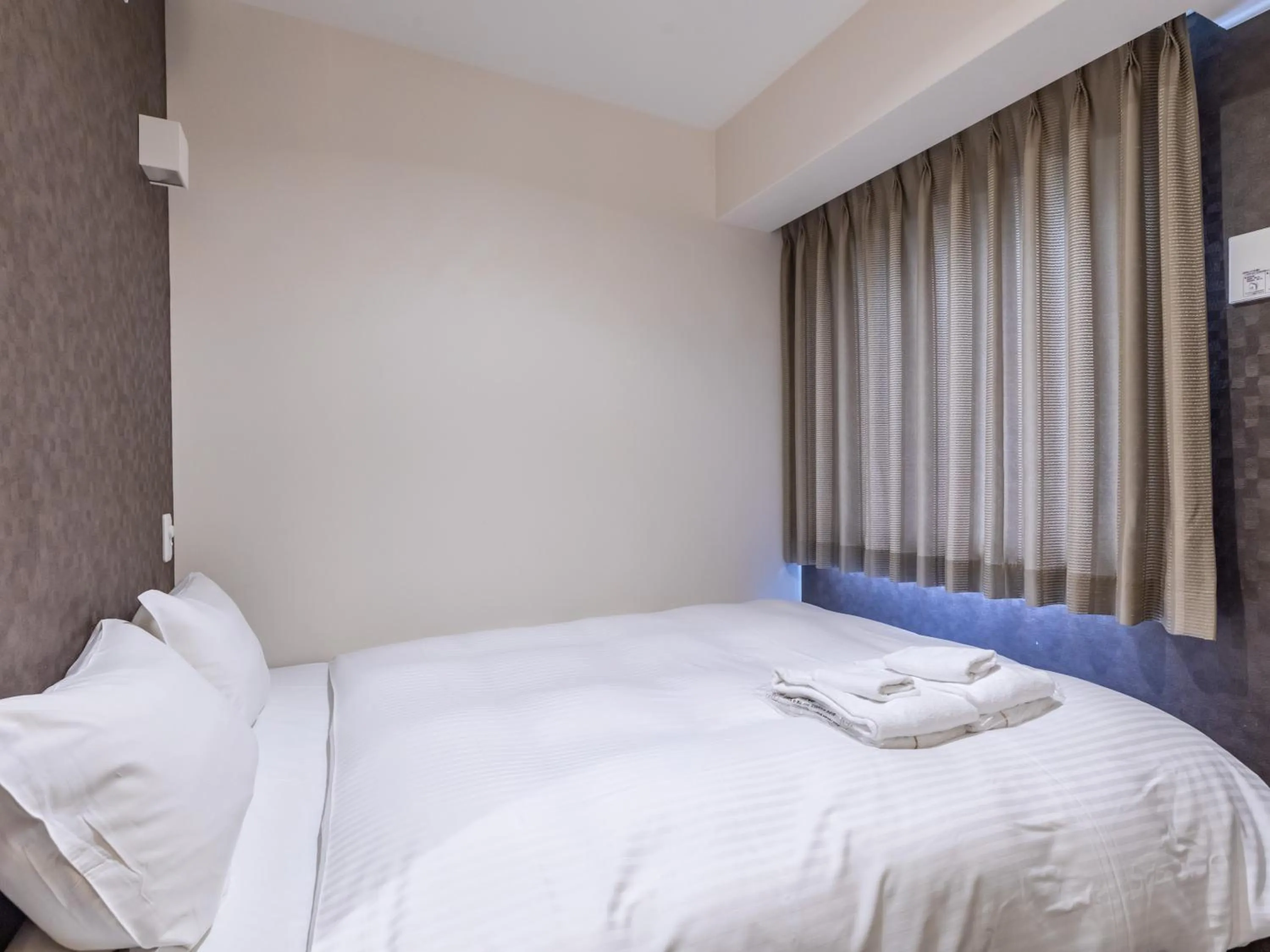 Bed in Hotel Excellence Enmachi Ekimae