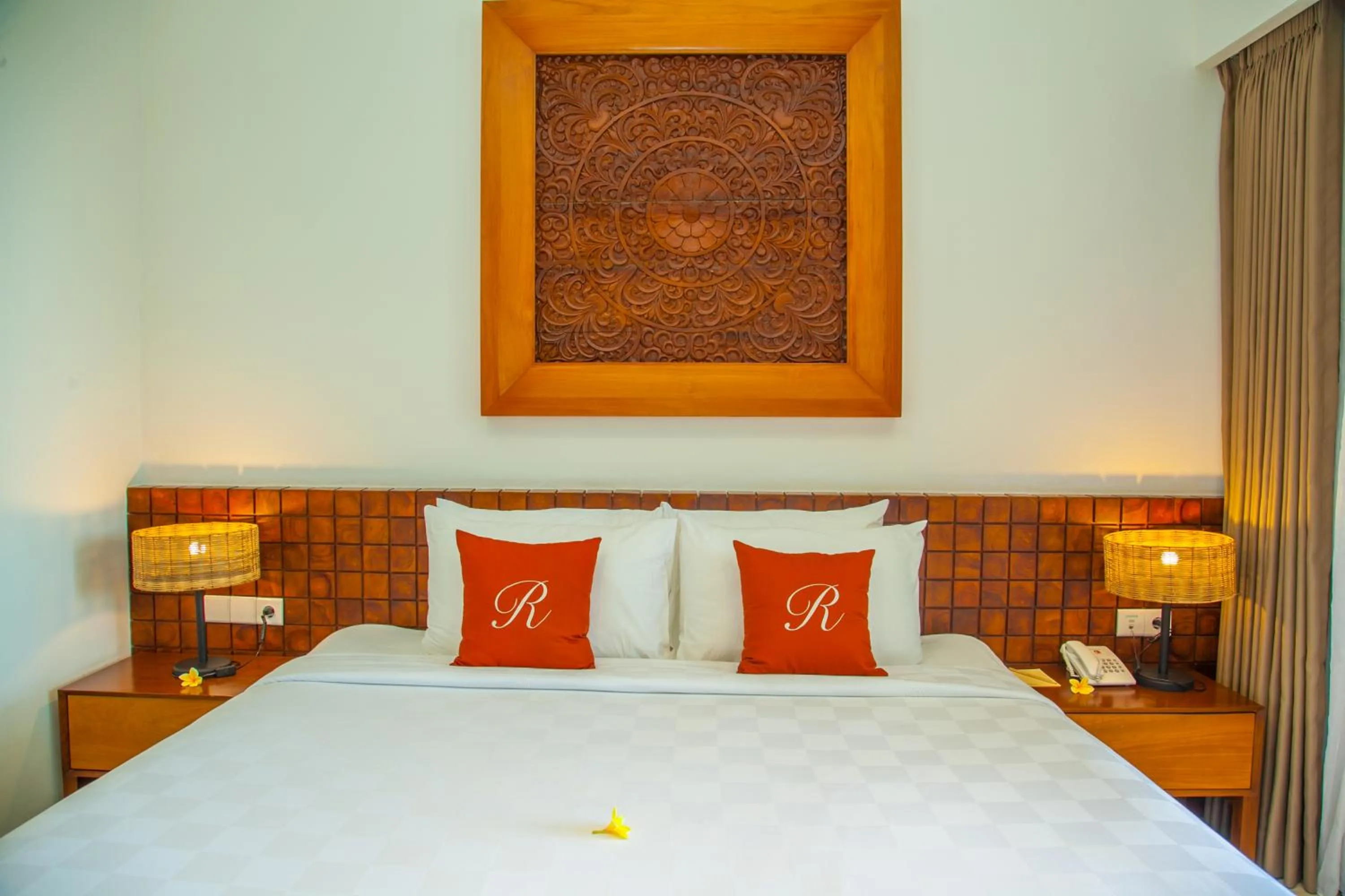 Bed in Rajavilla Lombok Resort - Seaside Serenity