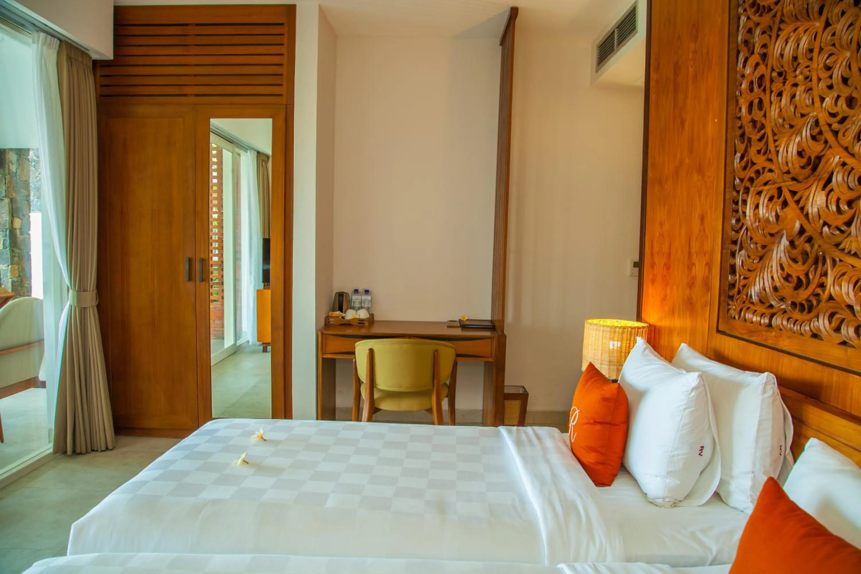 Bed in Rajavilla Lombok Resort - Seaside Serenity