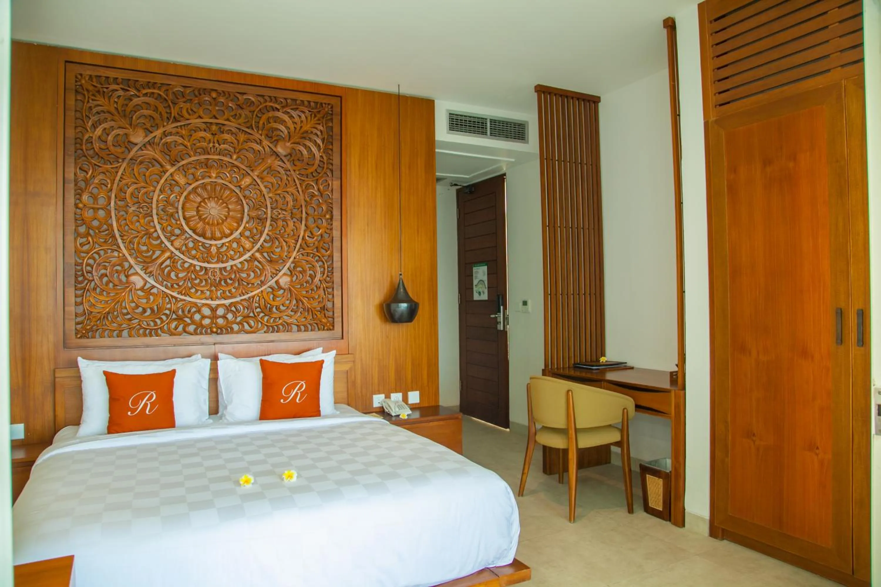 Bed in Rajavilla Lombok Resort - Seaside Serenity