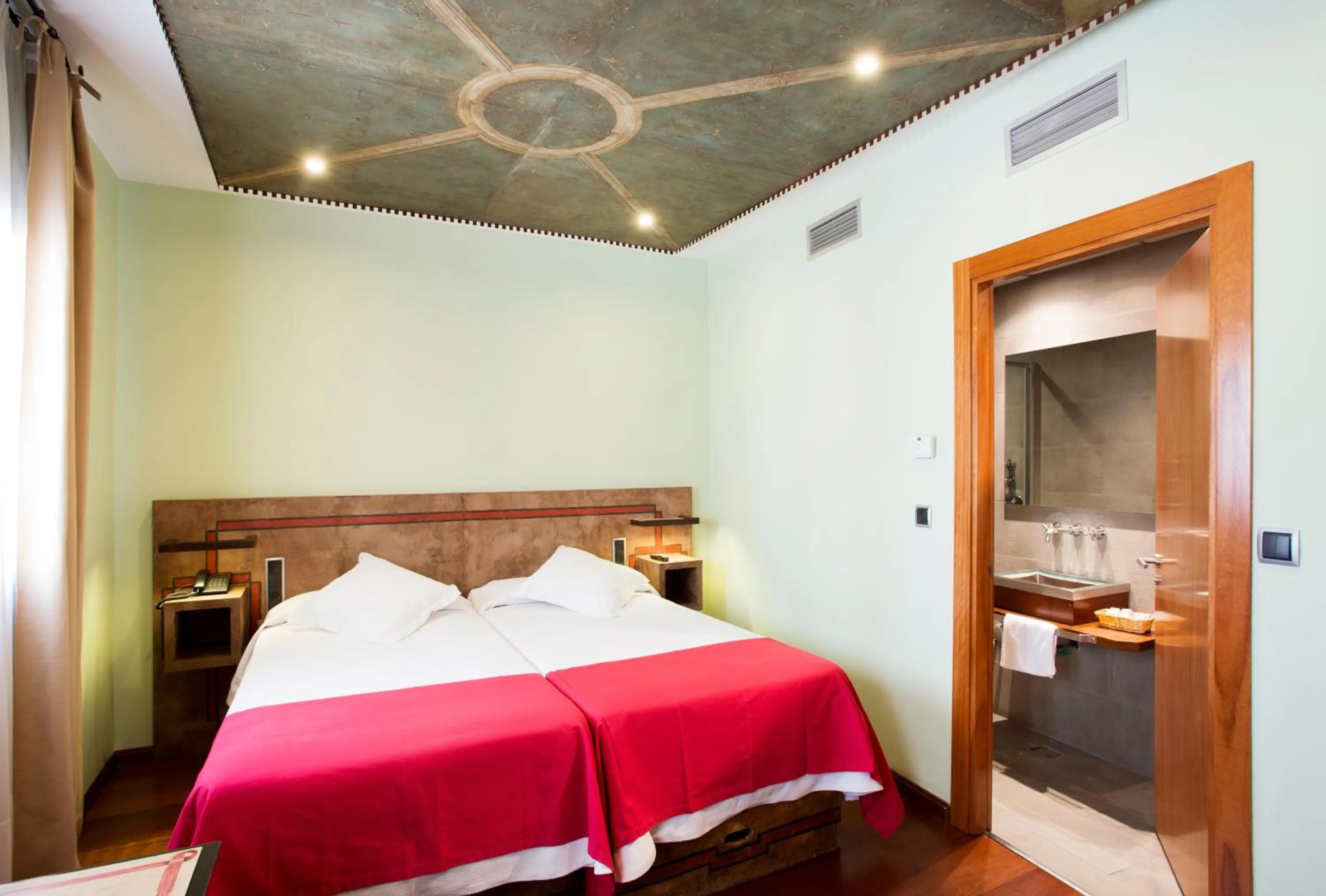 Bed in Hospedium Hotel Posada De La Luna