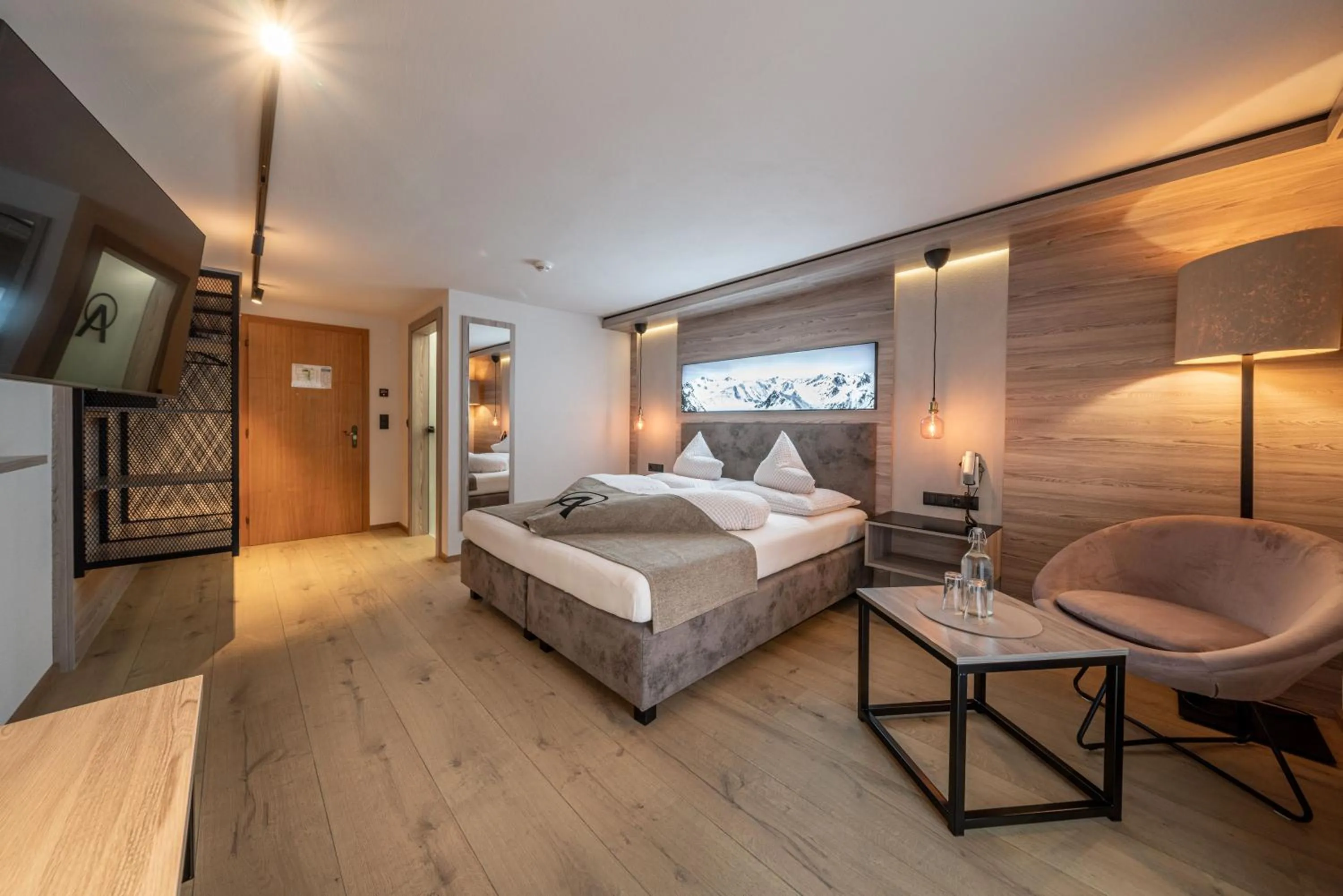 Photo of the whole room, Bed in Genusshotel Alpenblick