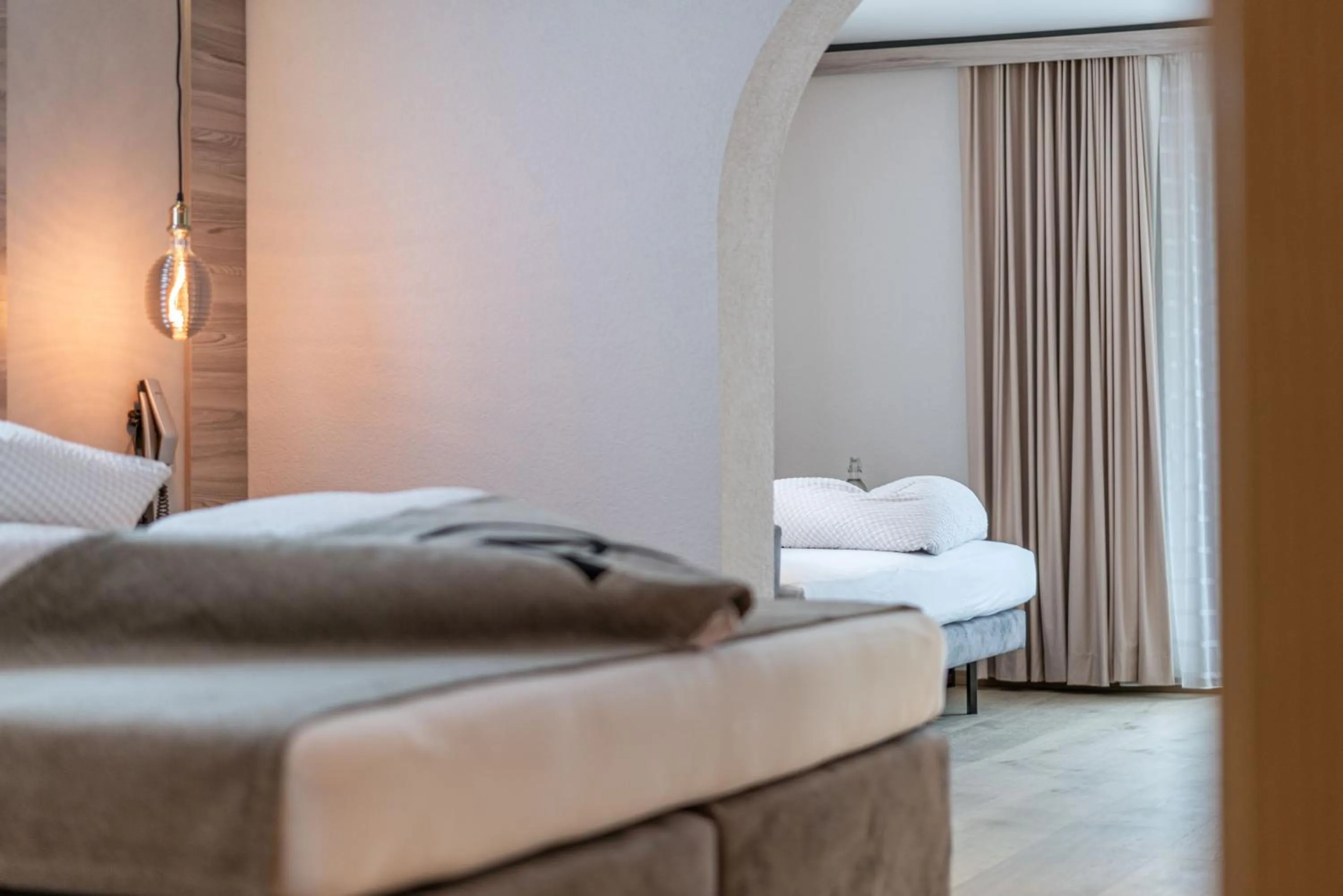 Photo of the whole room, Bed in Genusshotel Alpenblick