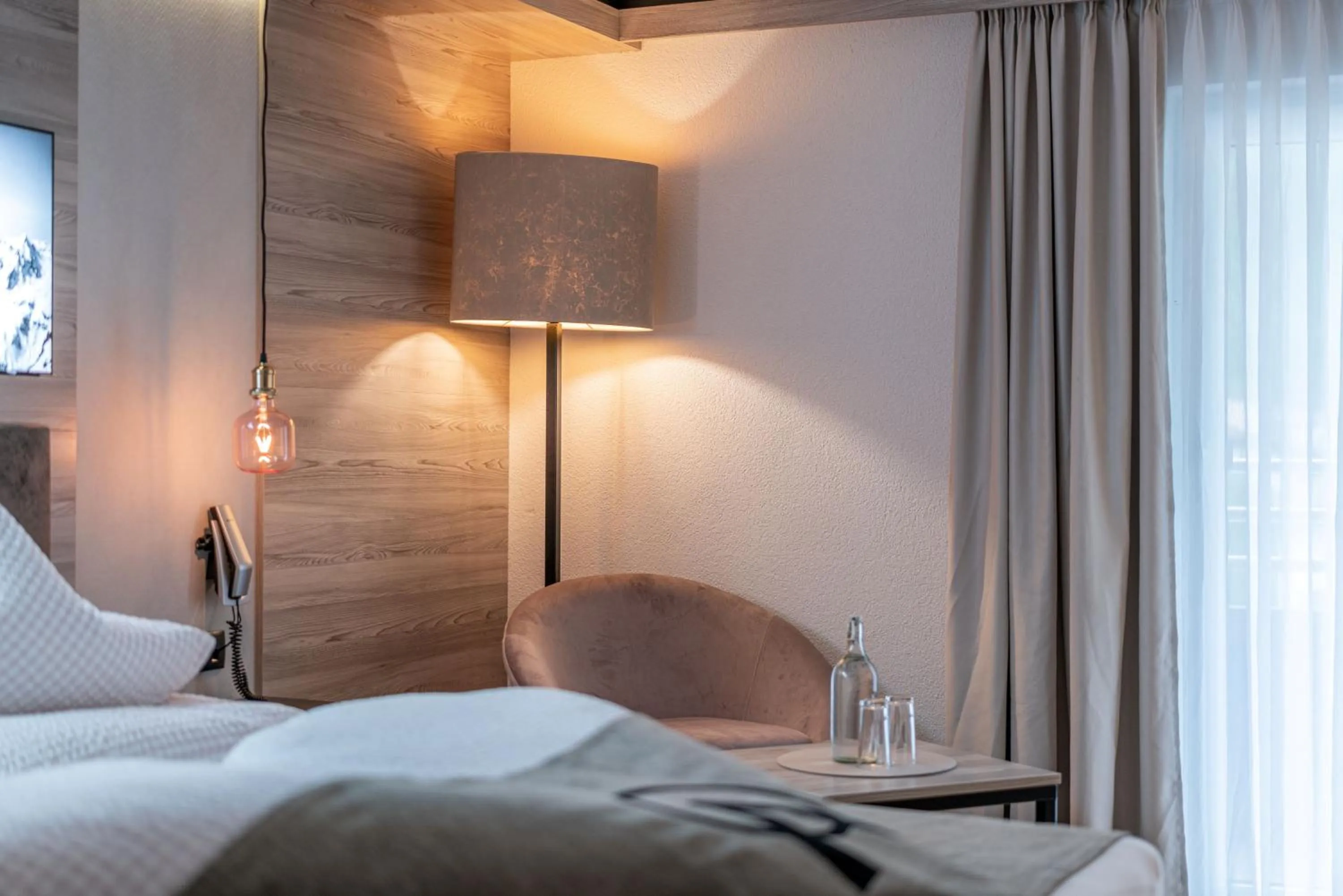 Photo of the whole room, Bed in Genusshotel Alpenblick