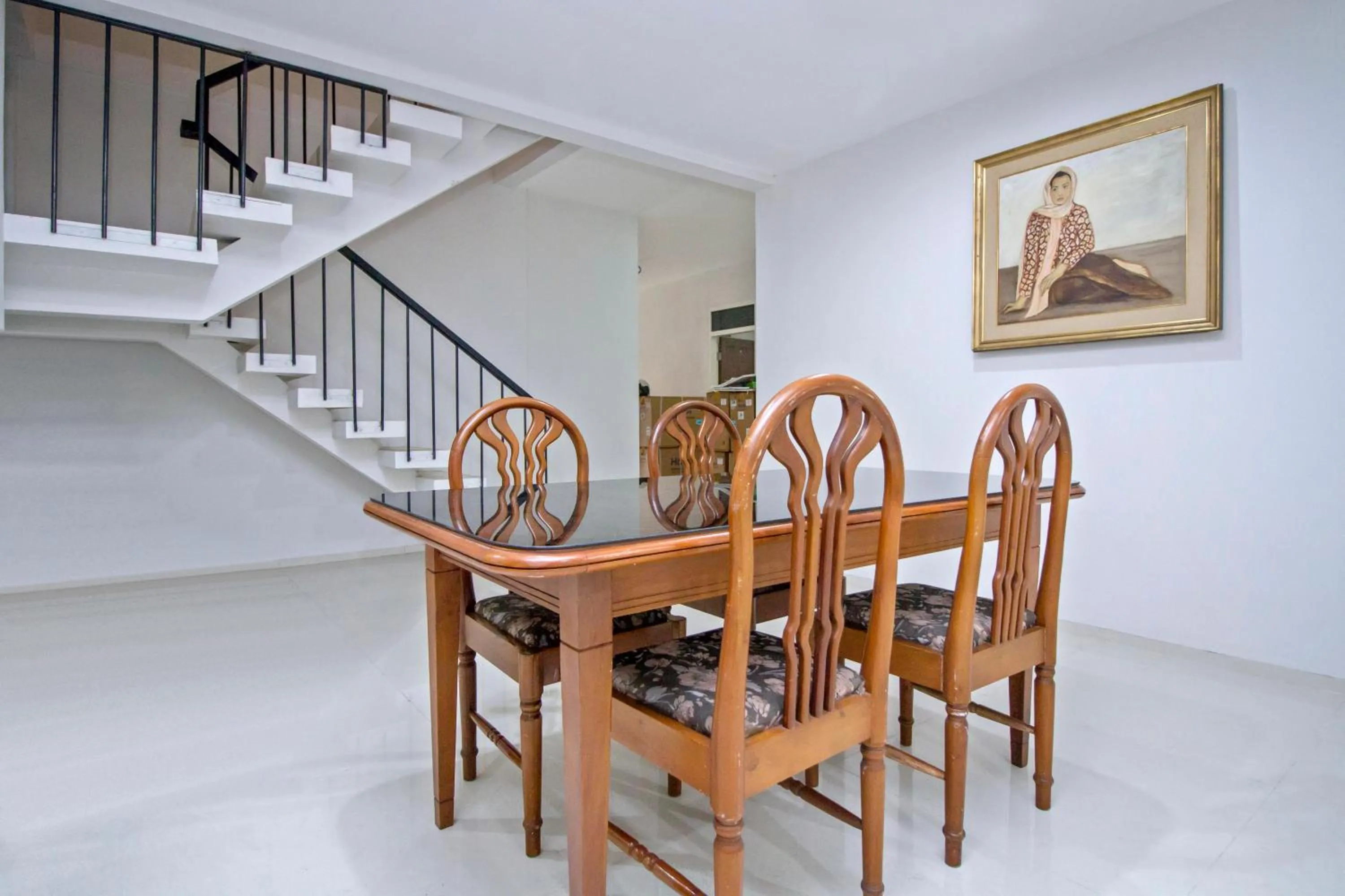 Seating area in UROOMS Tanah Abang