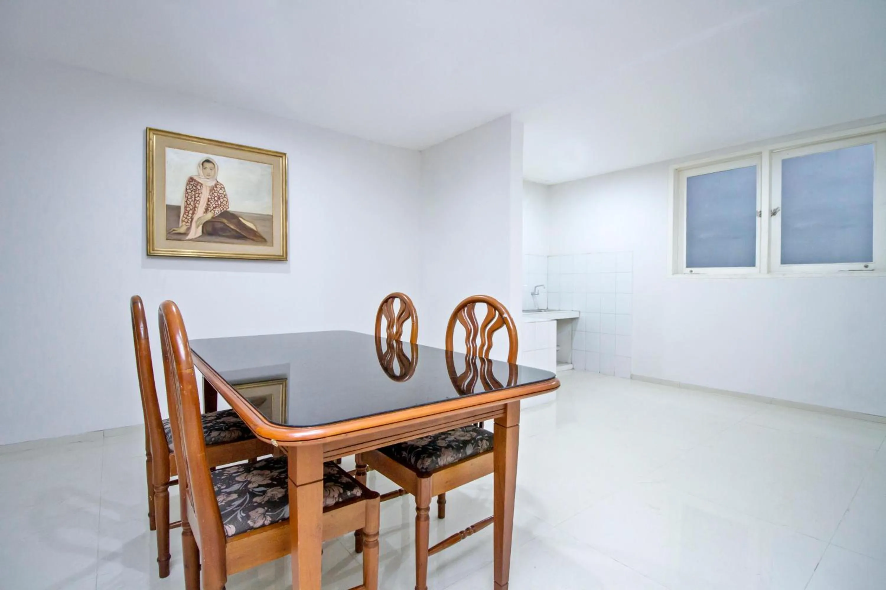 Seating area in UROOMS Tanah Abang