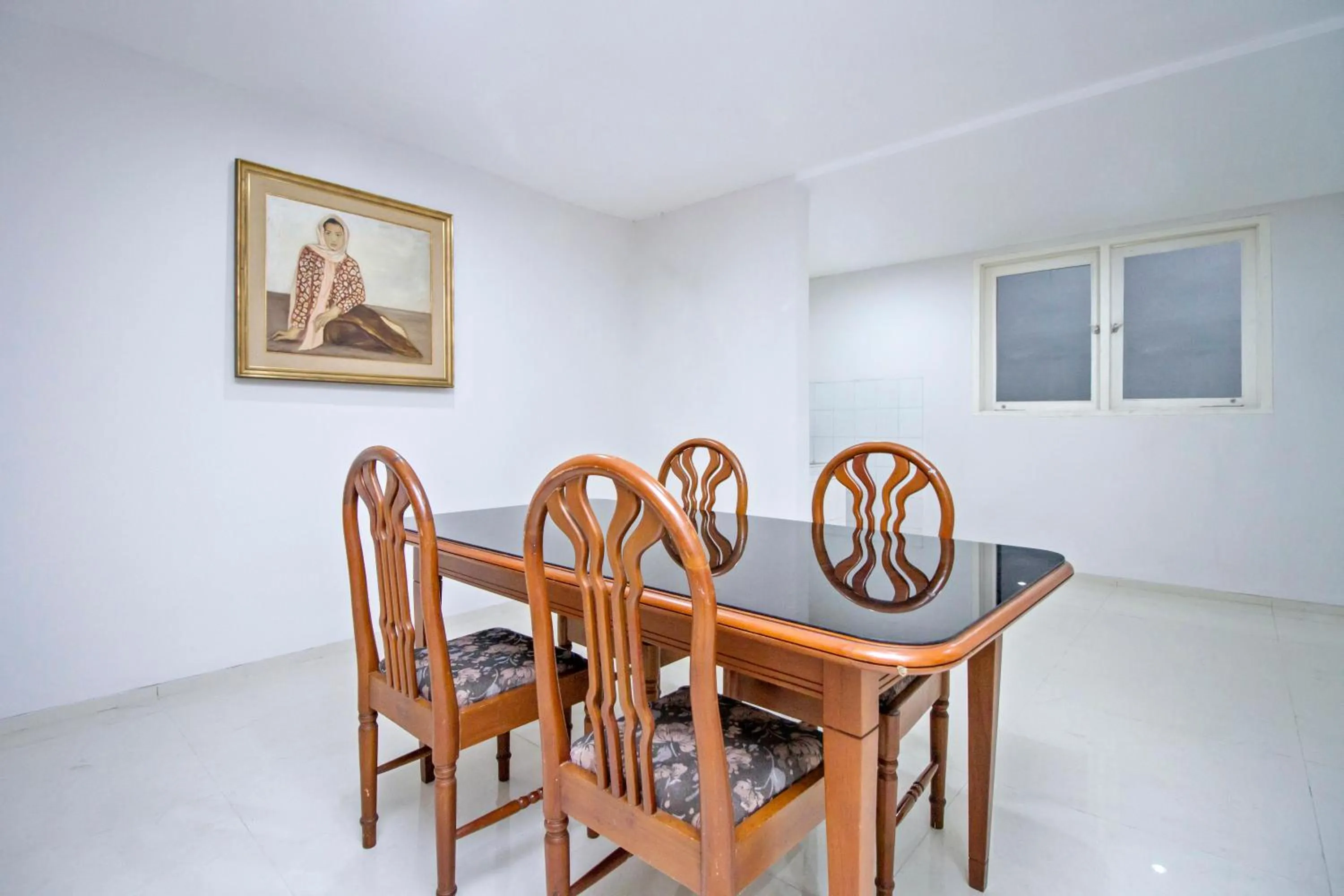 Seating area in UROOMS Tanah Abang