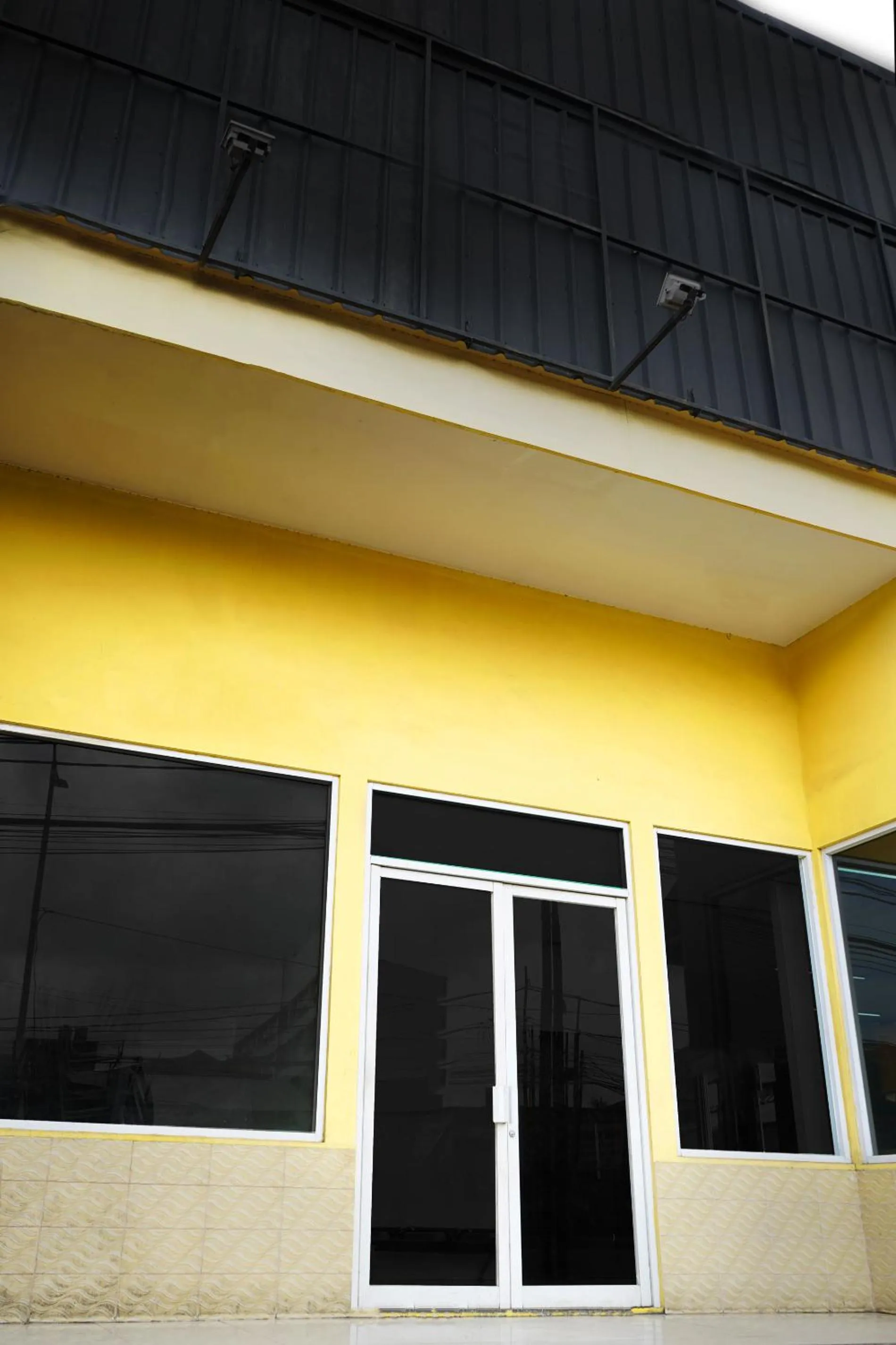 Property building in UROOMS Tanah Abang