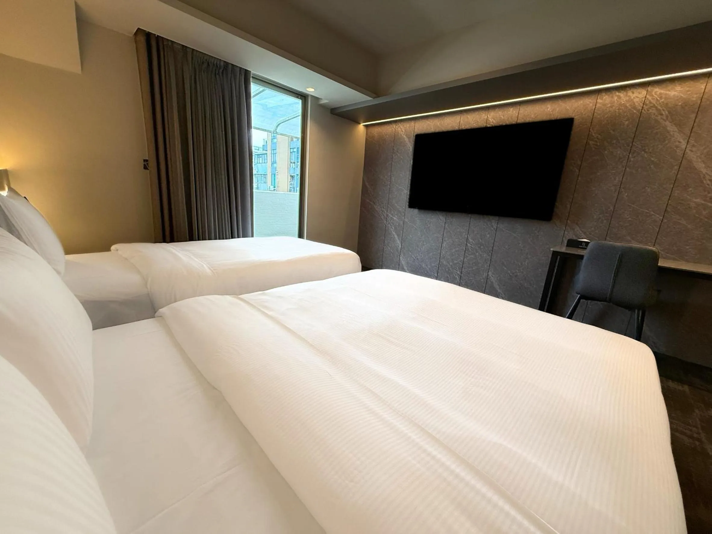 Photo of the whole room, Bed in Hub Hotel Ximen-inn Kunming