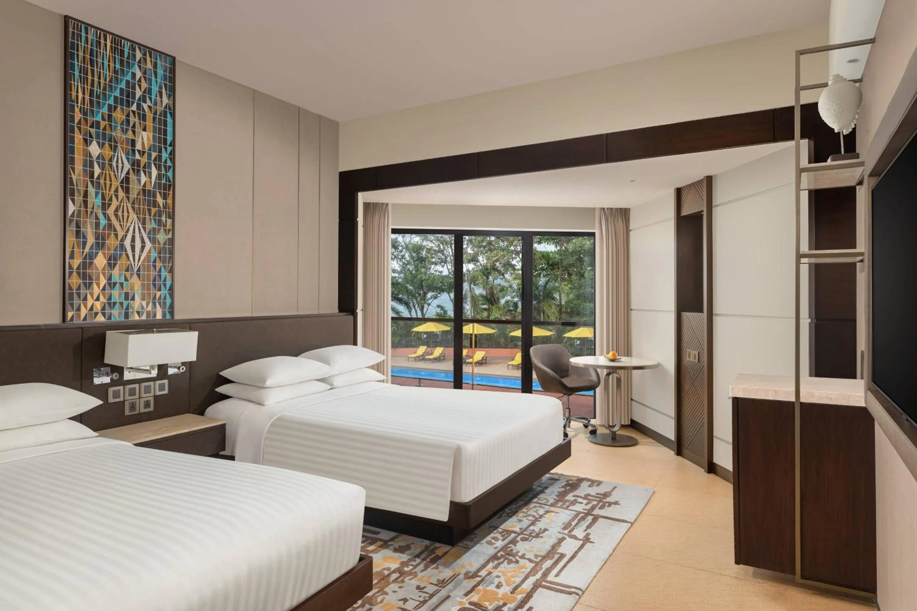 Swimming pool, Bed in Goa Marriott Resort & Spa