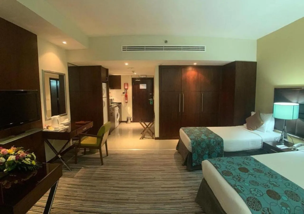 Bed in Phoenix Plaza Hotel Apartments