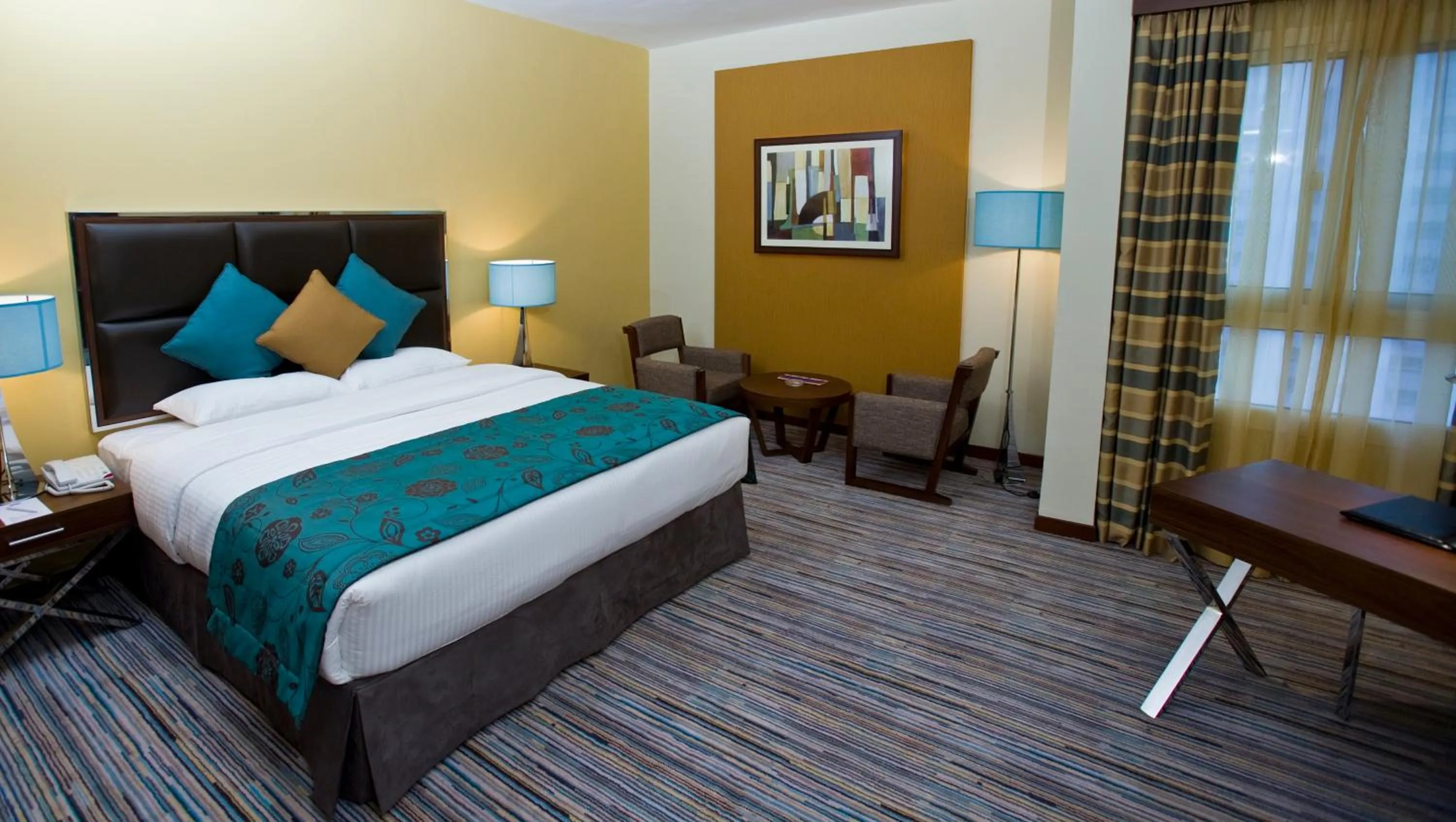 Bed in Phoenix Plaza Hotel Apartments