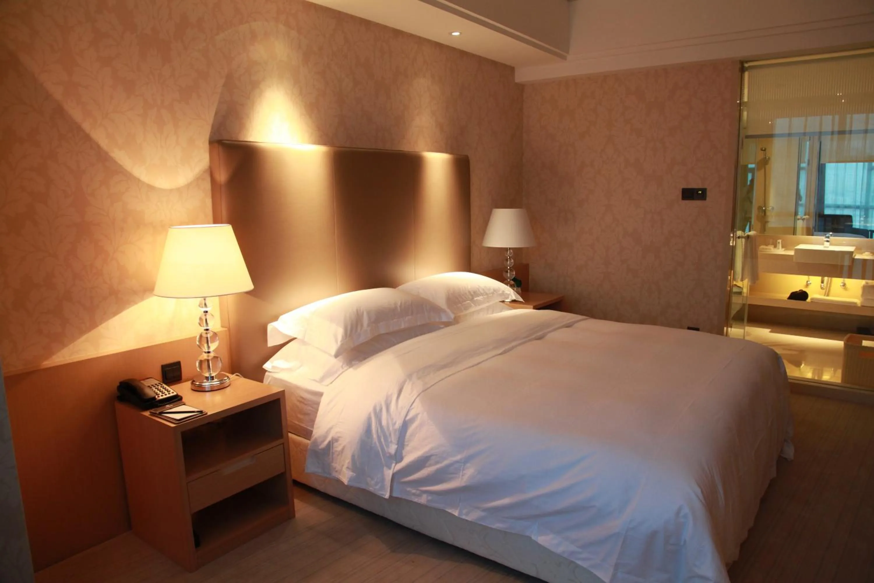 Bed in Wudang International Hotel