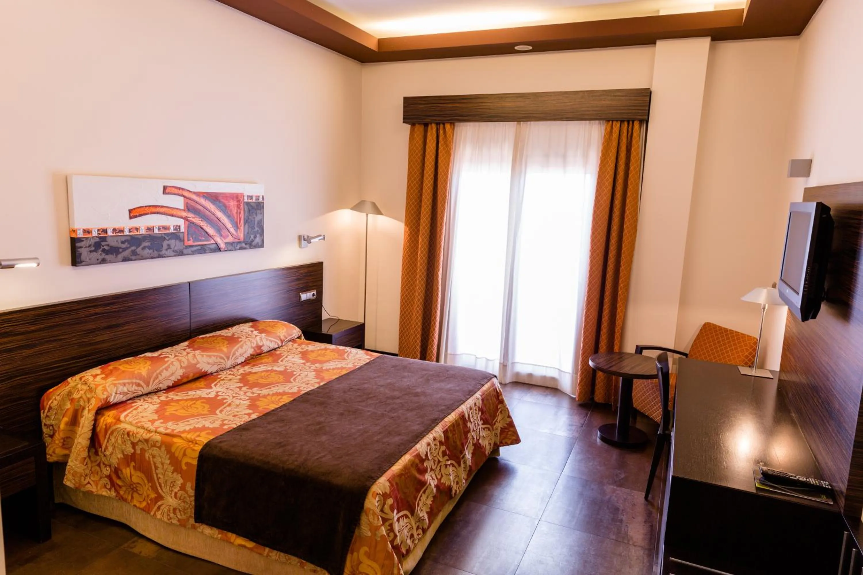 Bed in Hospedium Hotel Los Periquitos