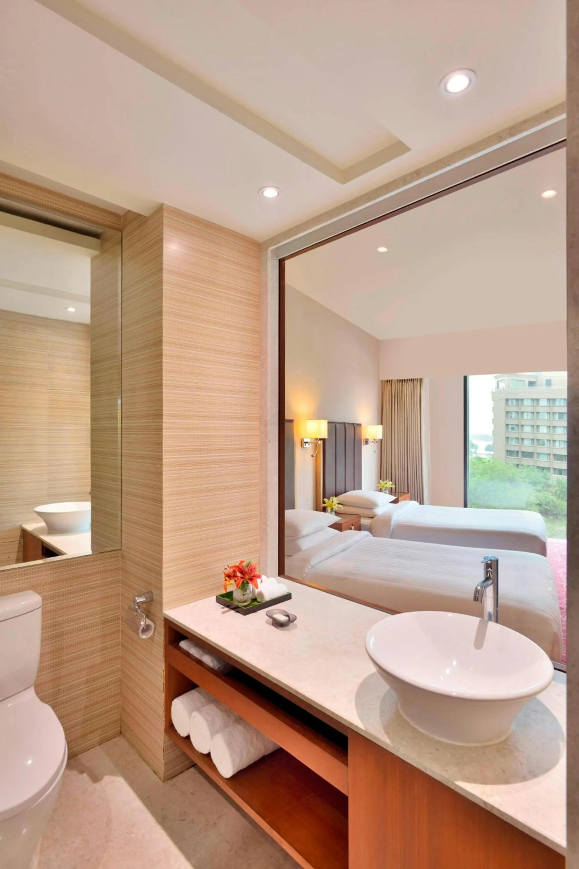 Bathroom, Bed in Courtyard by Marriott Hyderabad