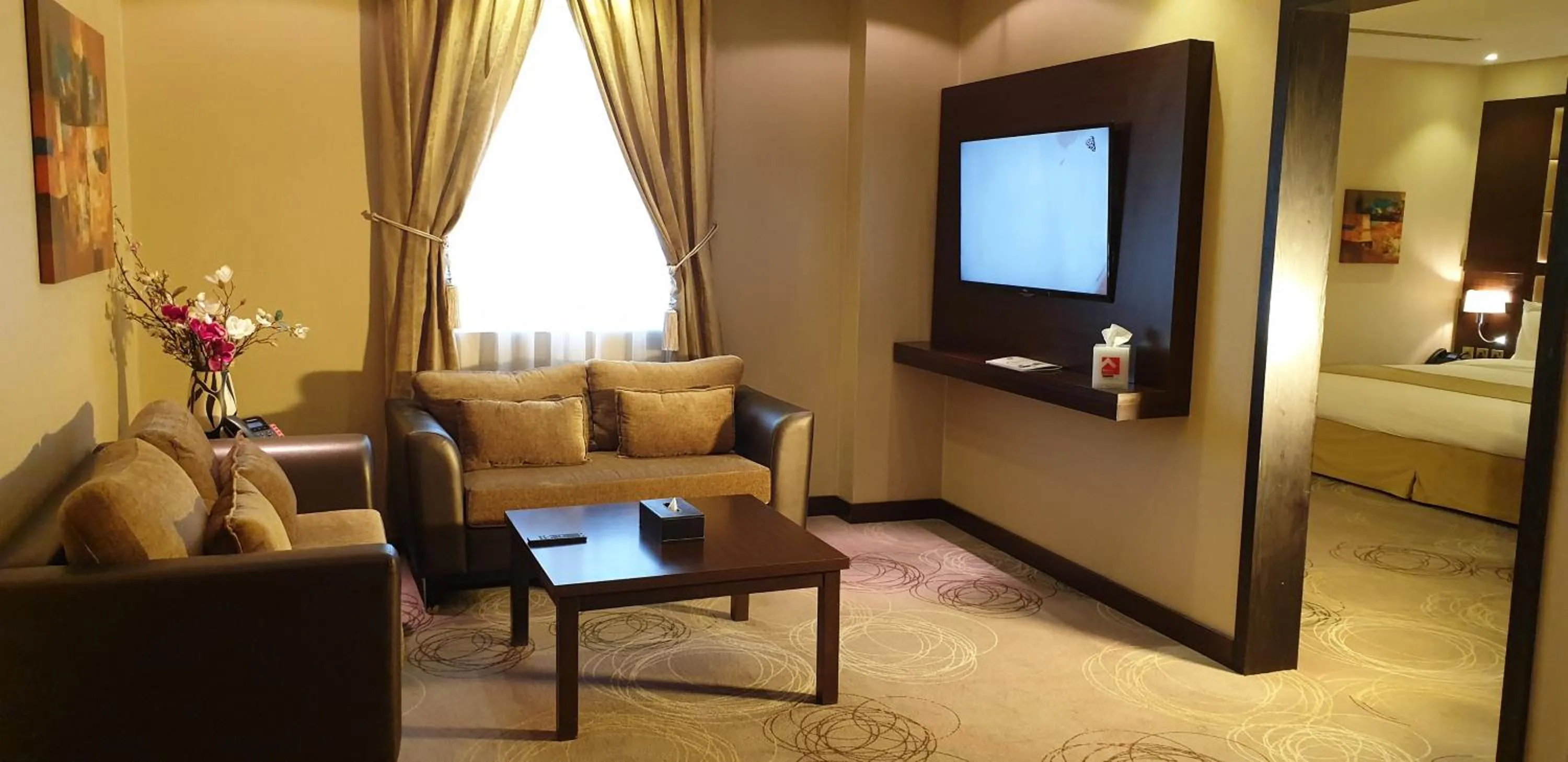 TV and multimedia in Swiss Flora Inn Hotel Riyadh