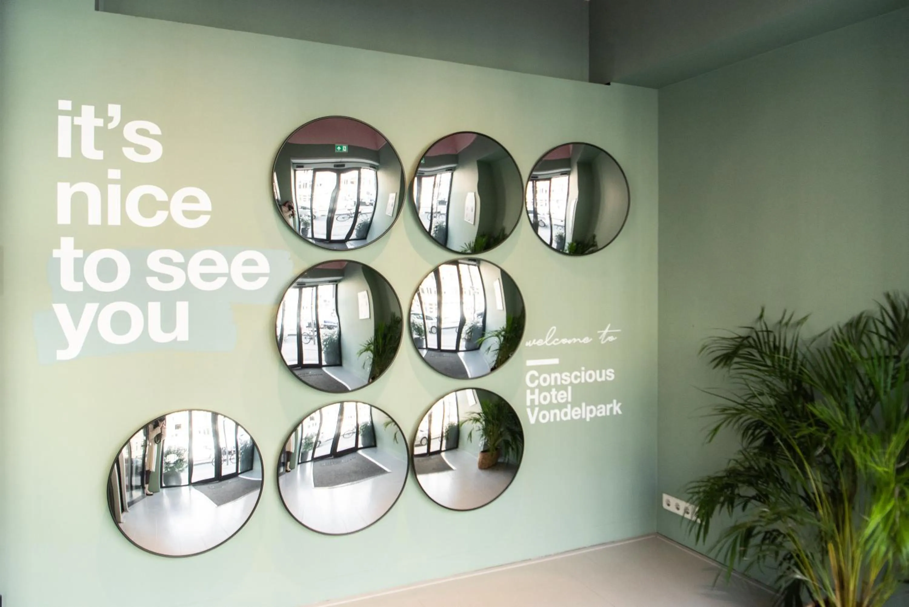 Text overlay in Conscious Hotel Vondelpark