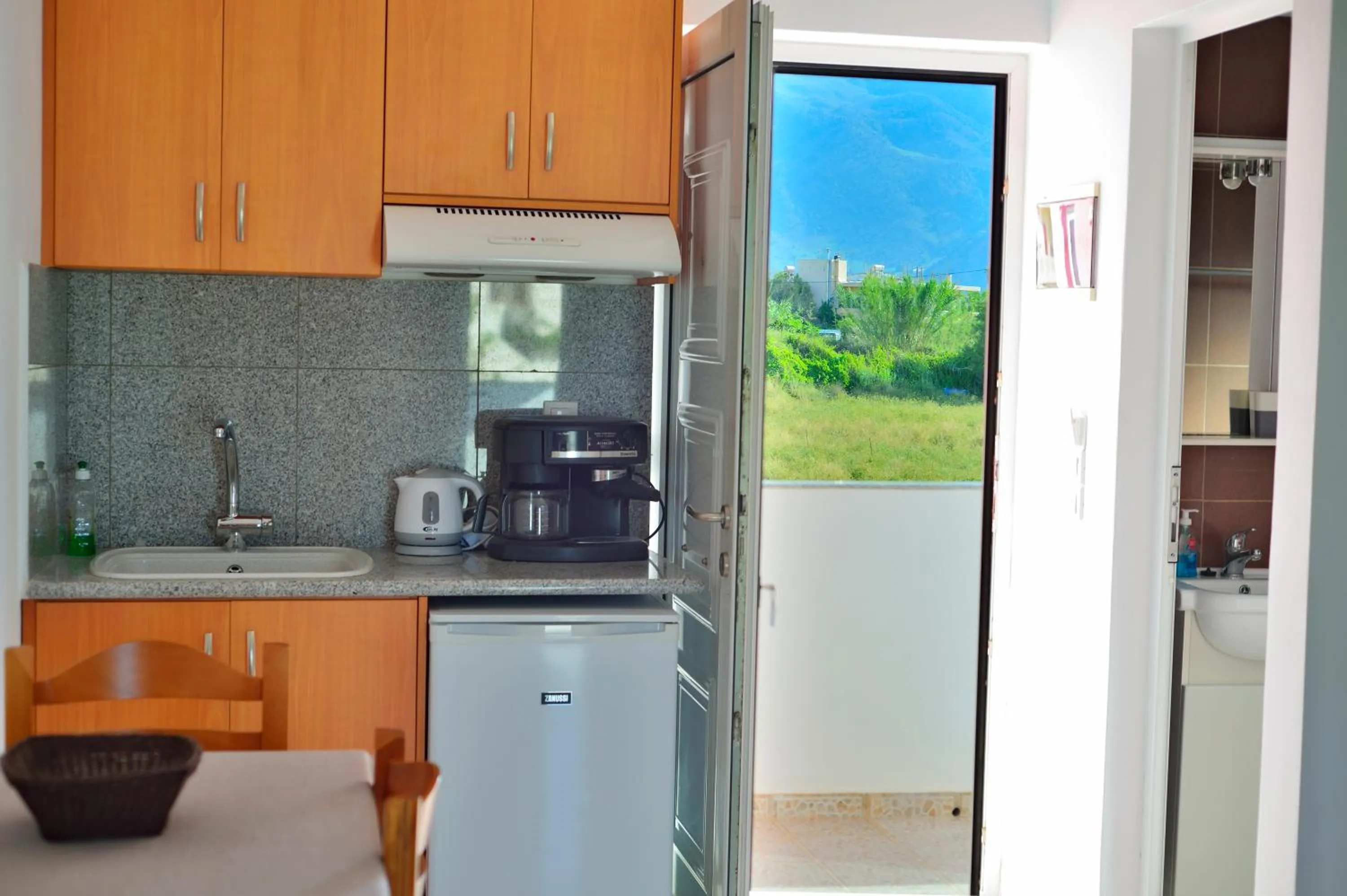 Kitchen or kitchenette in Reina Apartments