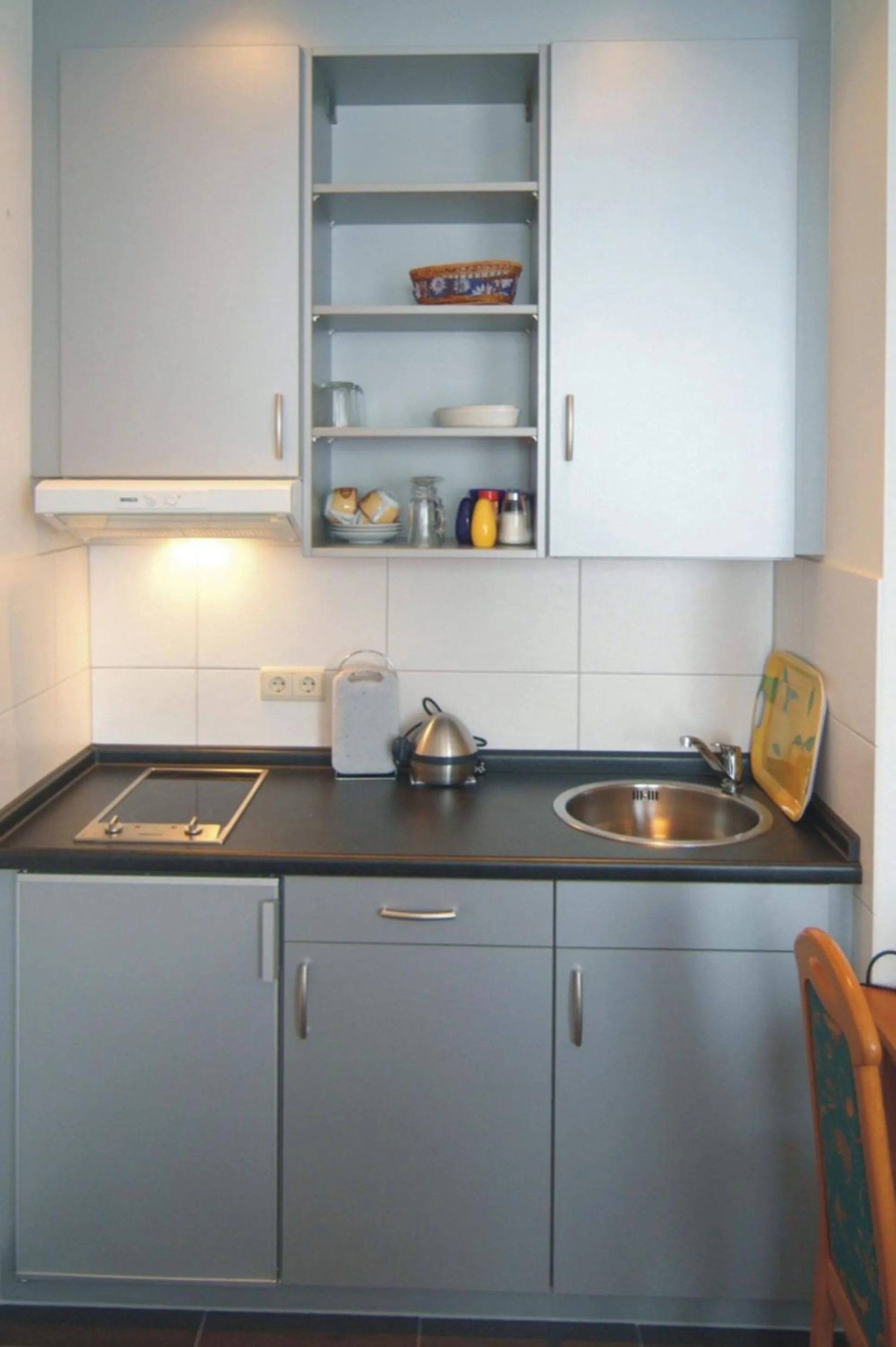 Kitchen or kitchenette in Aparthotel am Kurpark