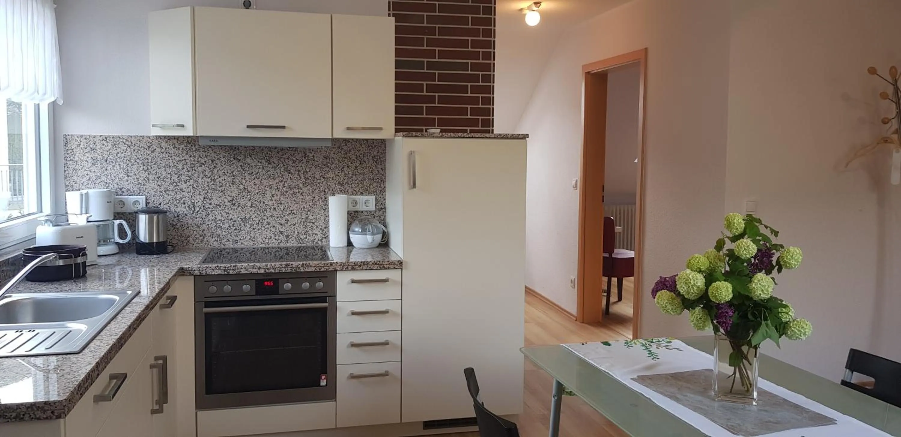 Kitchen or kitchenette in Aparthotel am Kurpark