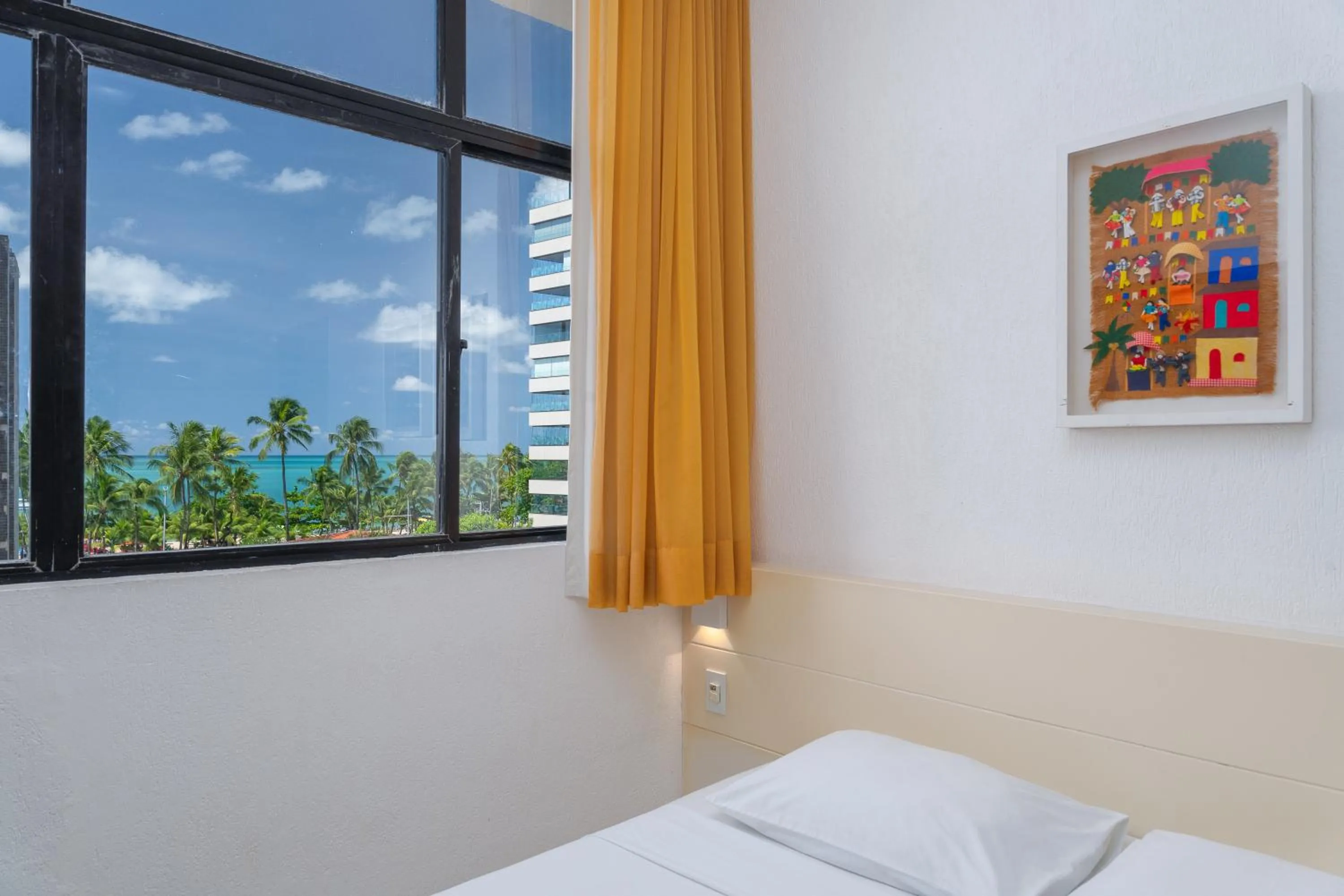 Bed in Ritz Plazamar Hotel