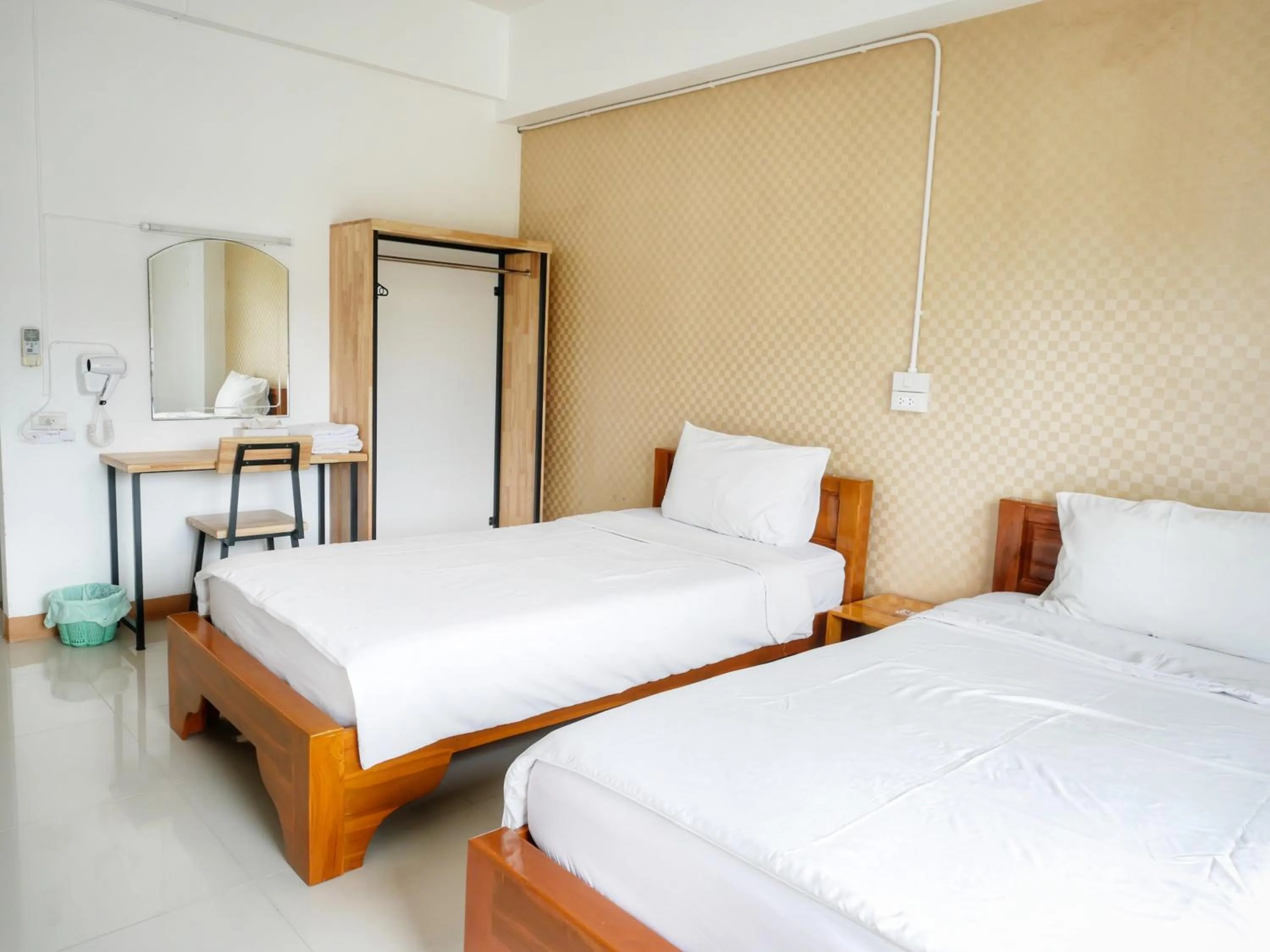 Bed in Fang Villa Hotel