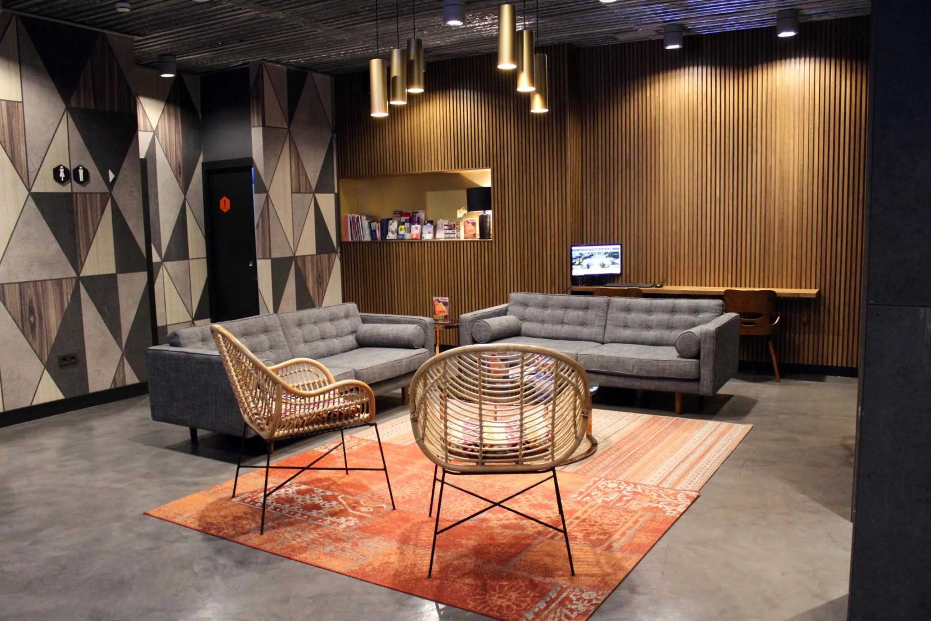 Communal lounge/ TV room in Málaga Premium Hotel