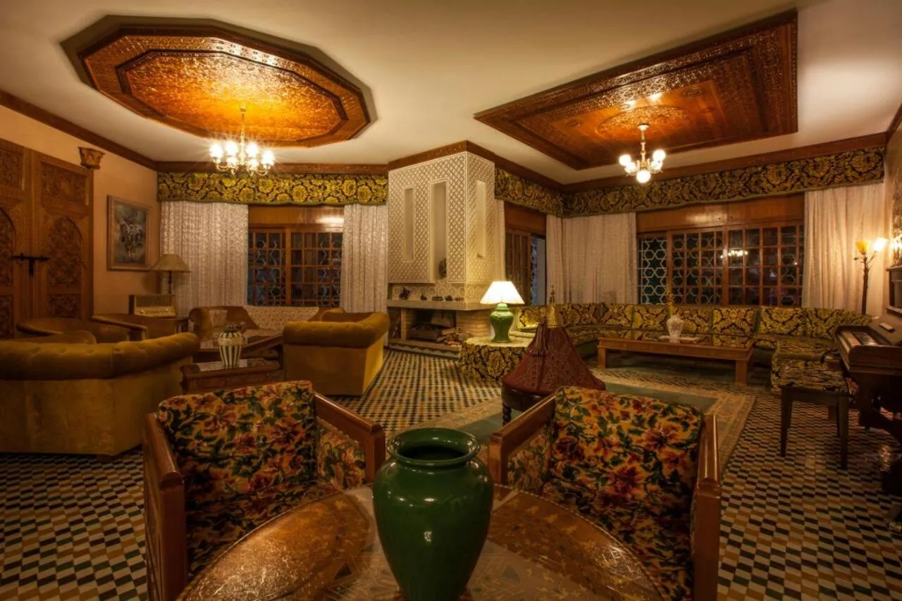 Communal lounge/ TV room in Riad Alhambra