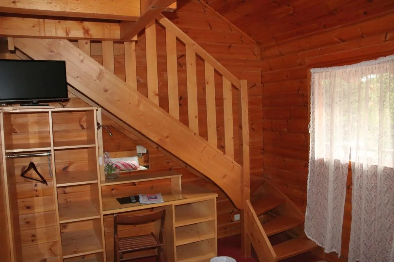 Seating area in Hotel Restaurant Home Des Hautes Vosges