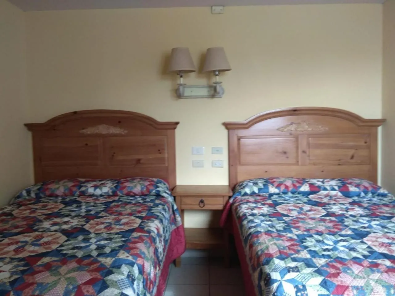 Bed in El Ejecutivo Aparthotel