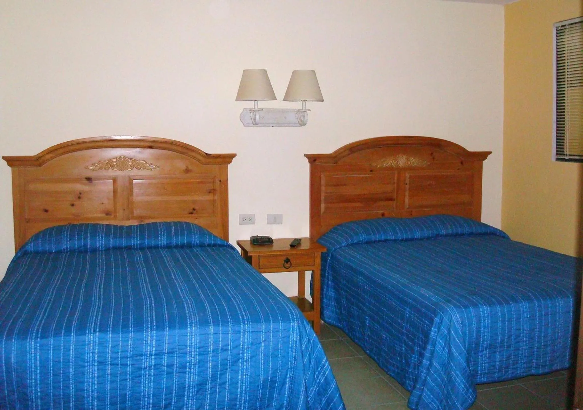 Bed in El Ejecutivo Aparthotel