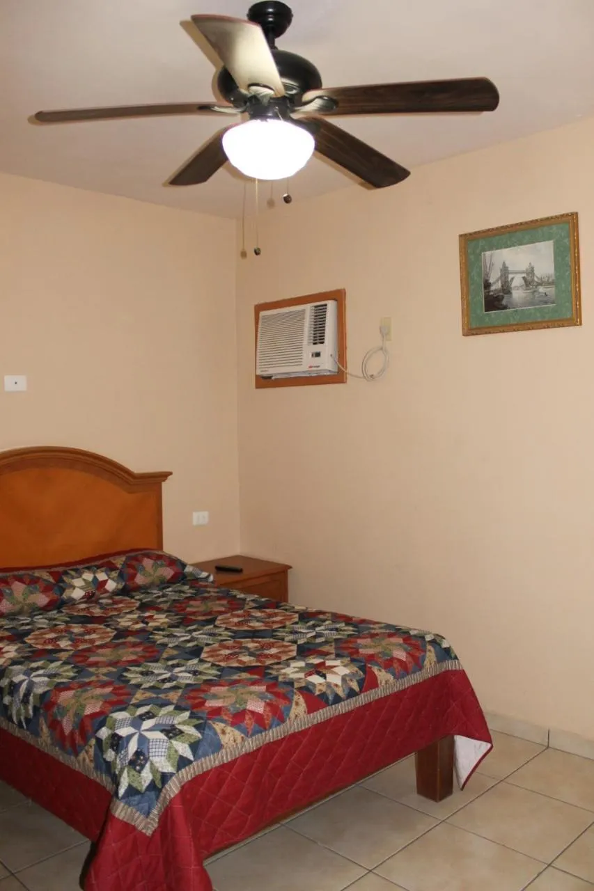 Bed in El Ejecutivo Aparthotel