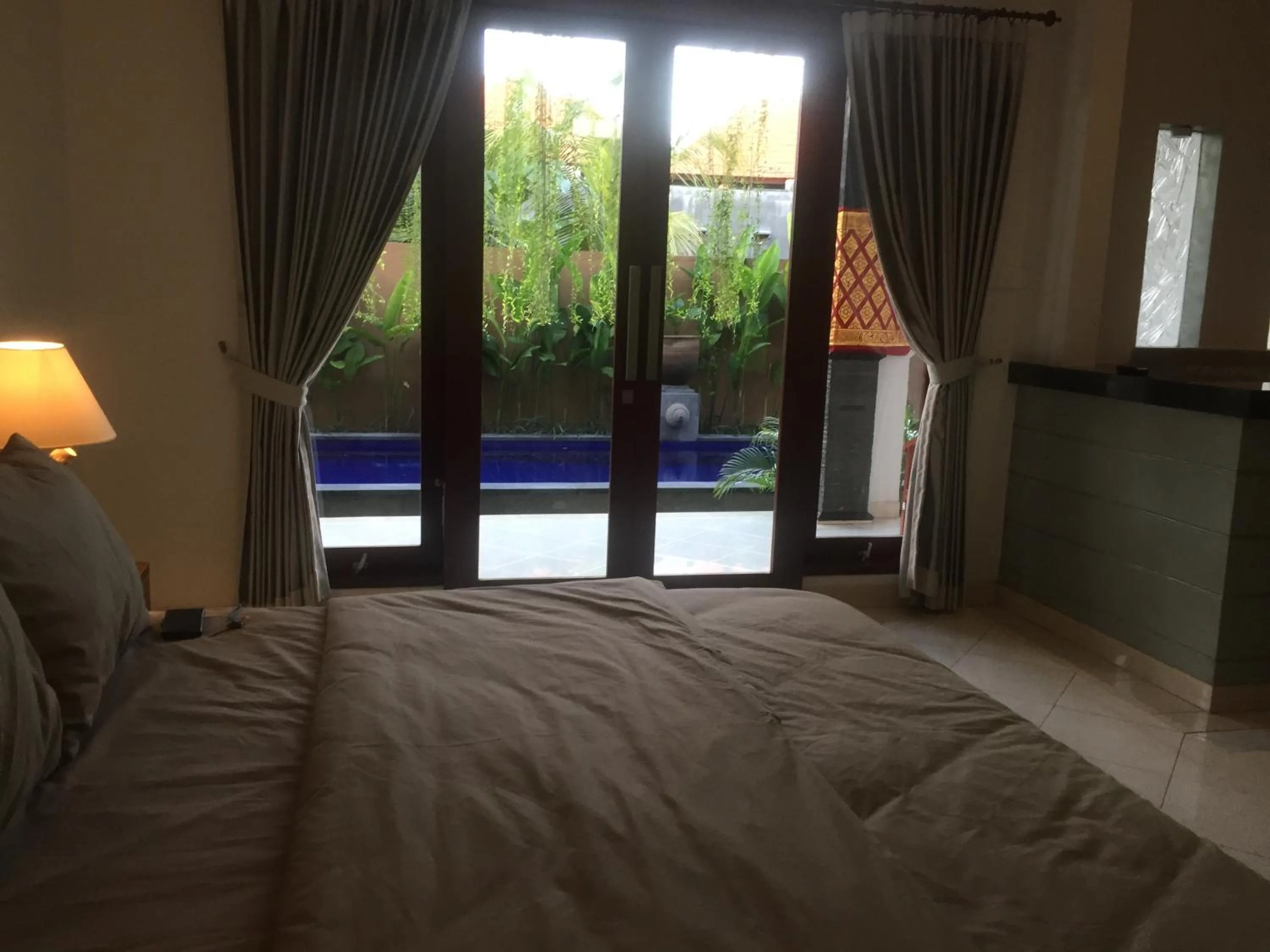 Bed in Surya Guest House Sanur