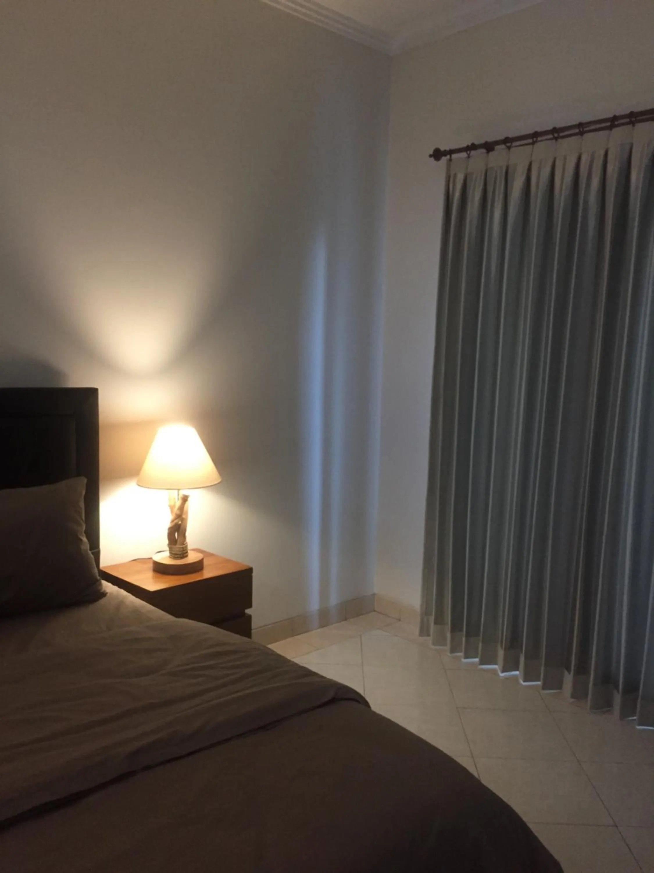 Bed in Surya Guest House Sanur