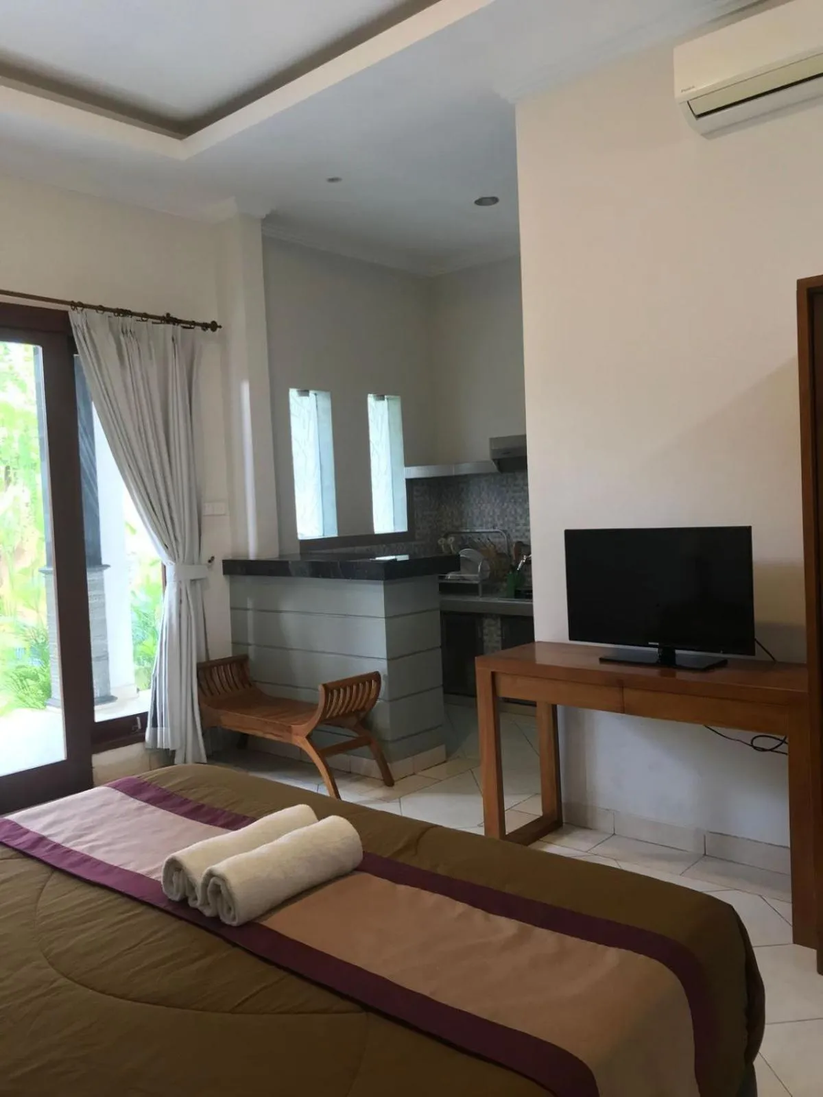 Bed in Surya Guest House Sanur