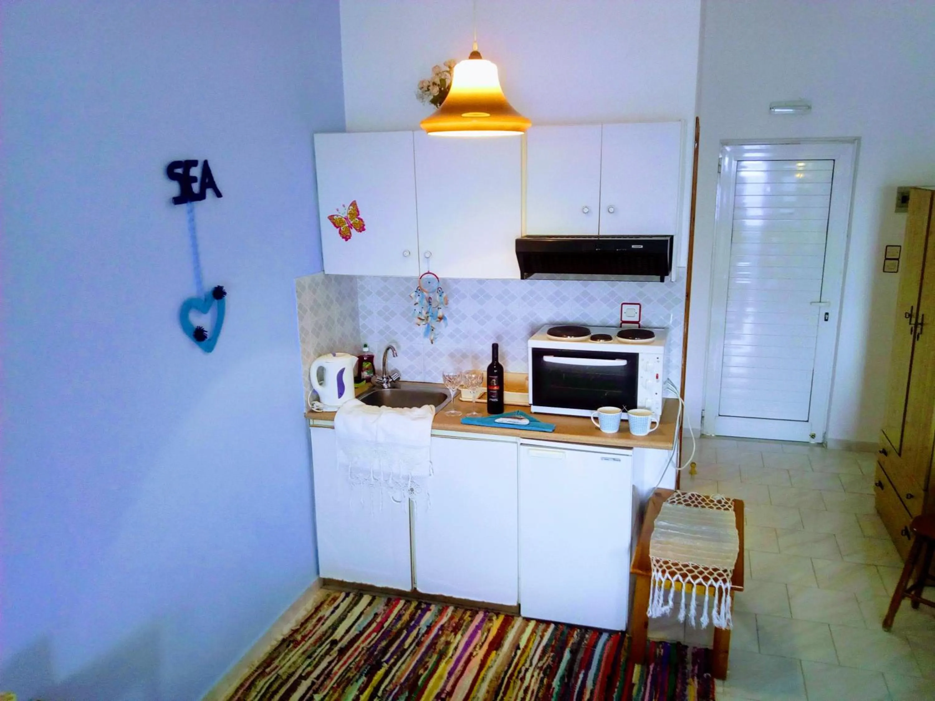 Kitchen or kitchenette in Paradisso Studios