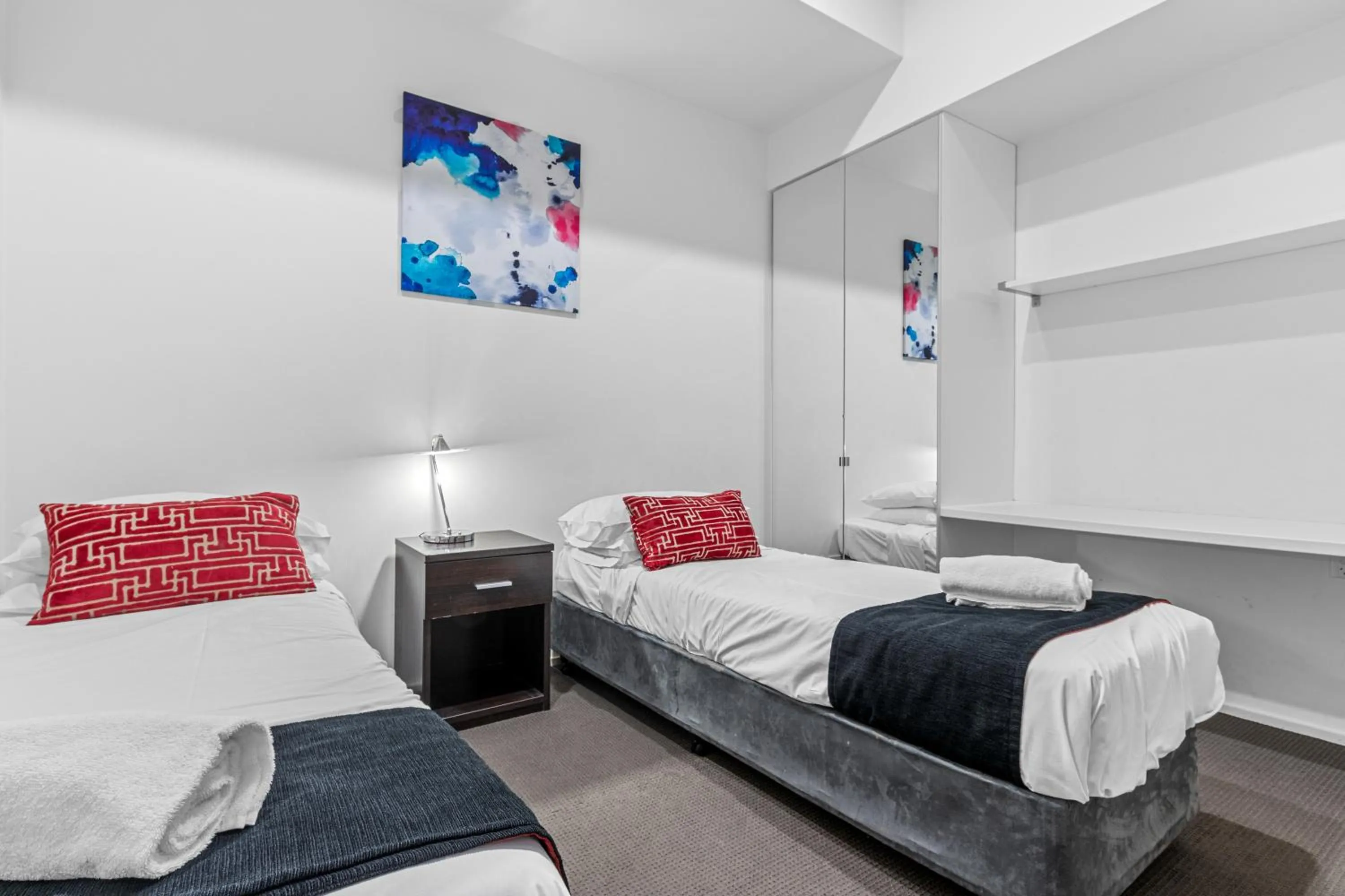 Bed in Comfort Apartments on Elizabeth