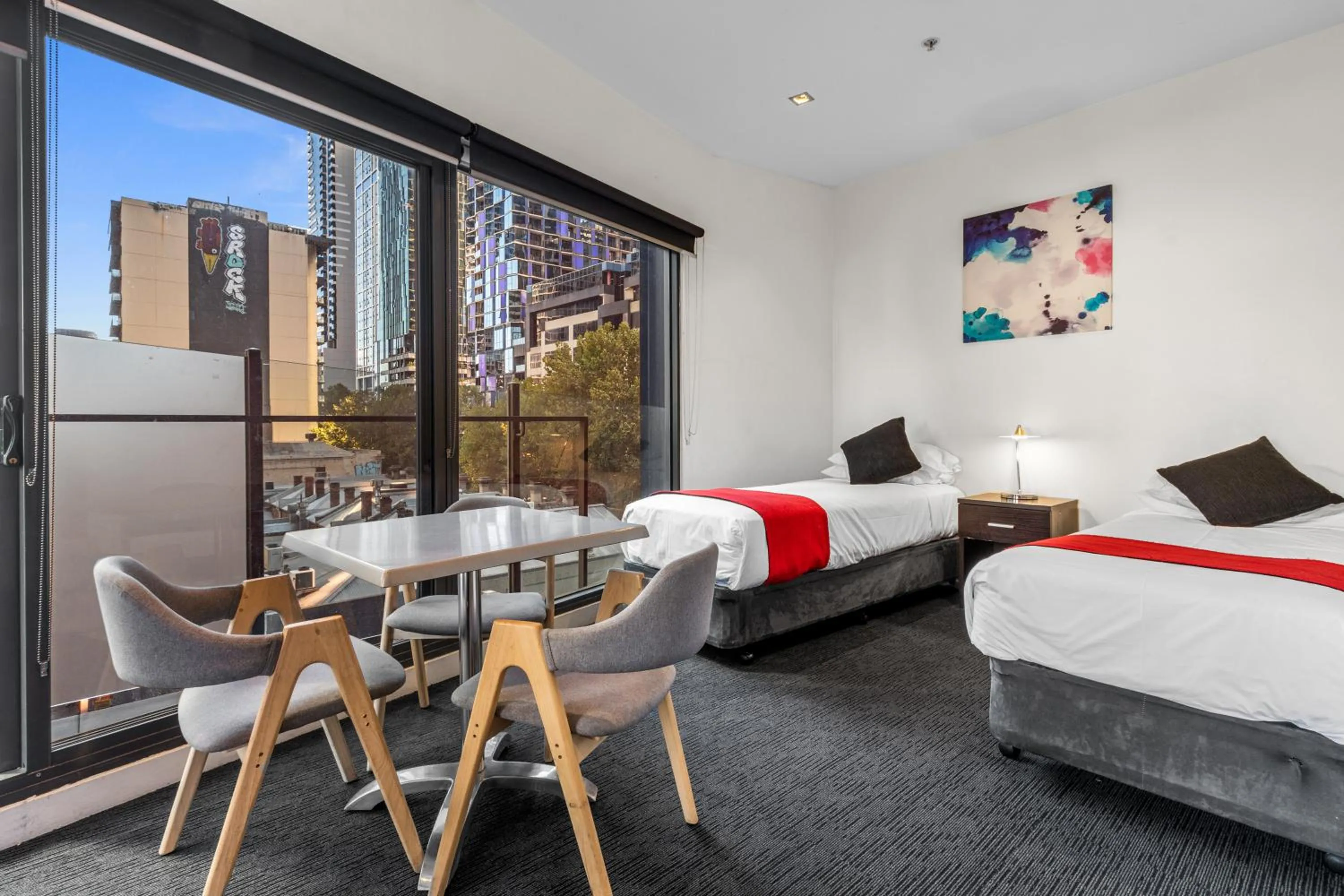 Bed in Comfort Apartments on Elizabeth