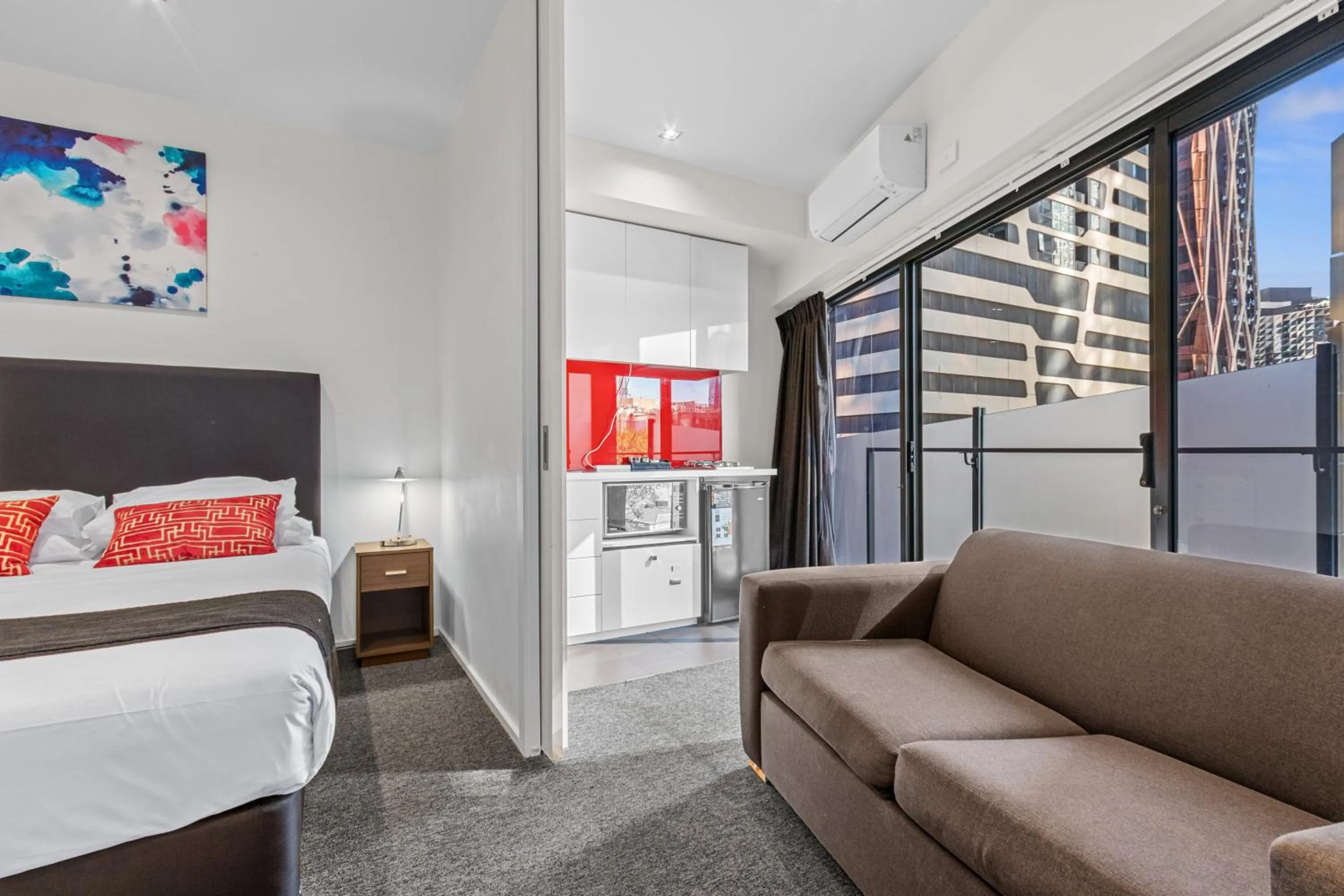 Bed in Comfort Apartments on Elizabeth