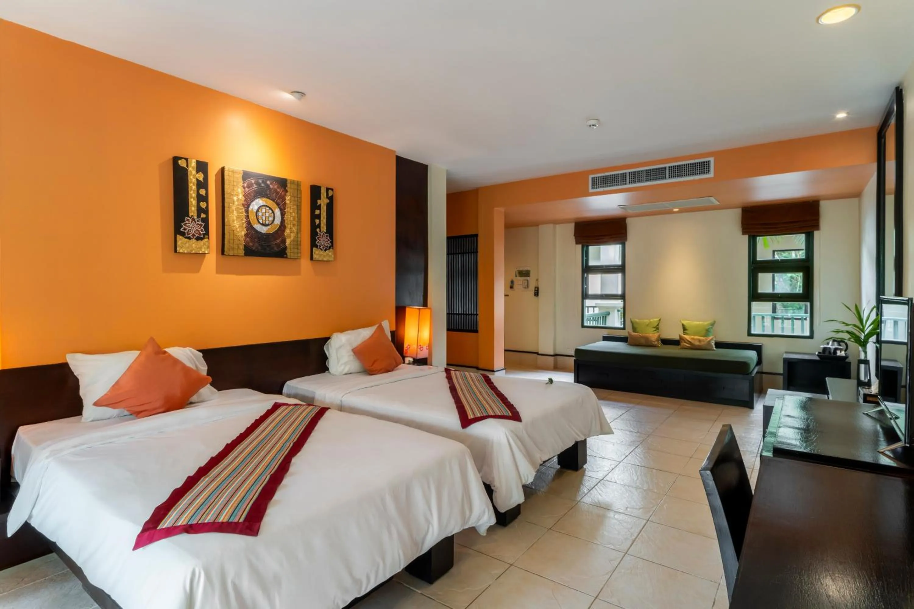 Bed in Baan Khaolak Beach Resort