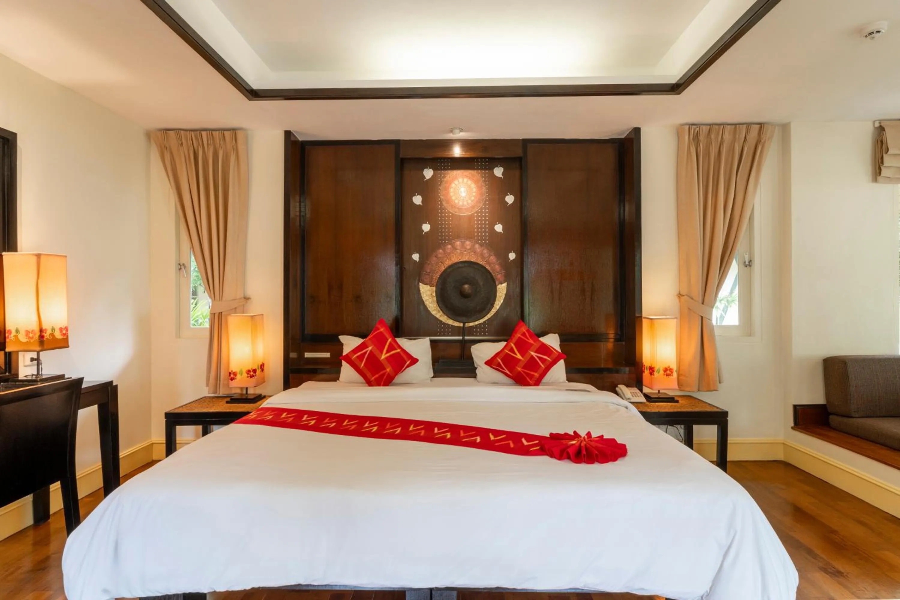 Bed in Baan Khaolak Beach Resort