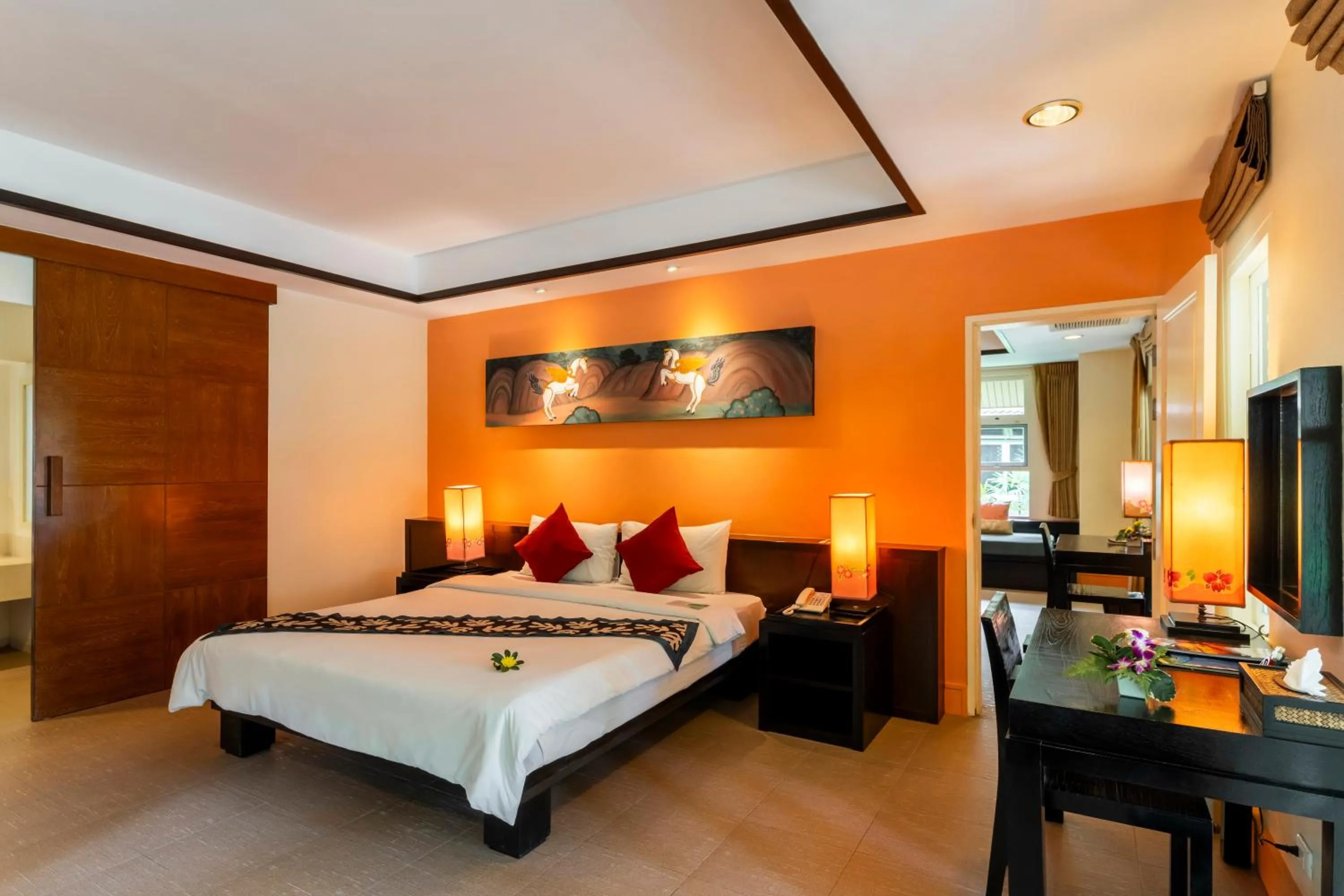 Bed in Baan Khaolak Beach Resort